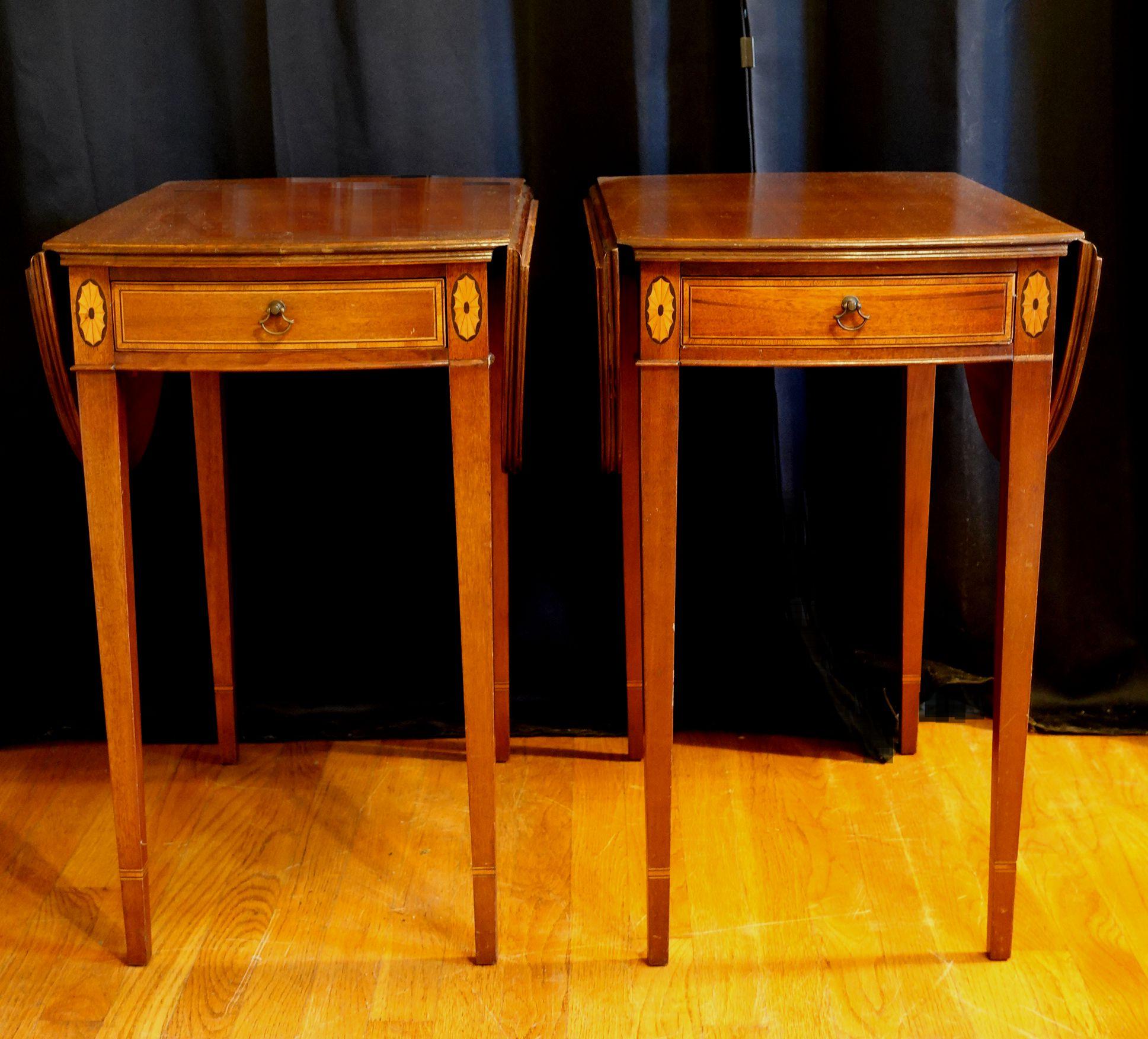 Antique pair mahogany banded pembroke drop-leaf extension side table with front drawer. Each table is in excellent antique condition. Minor wear consistent with age / use and some small missing sticks. Each side table measure 26.25 inches high x