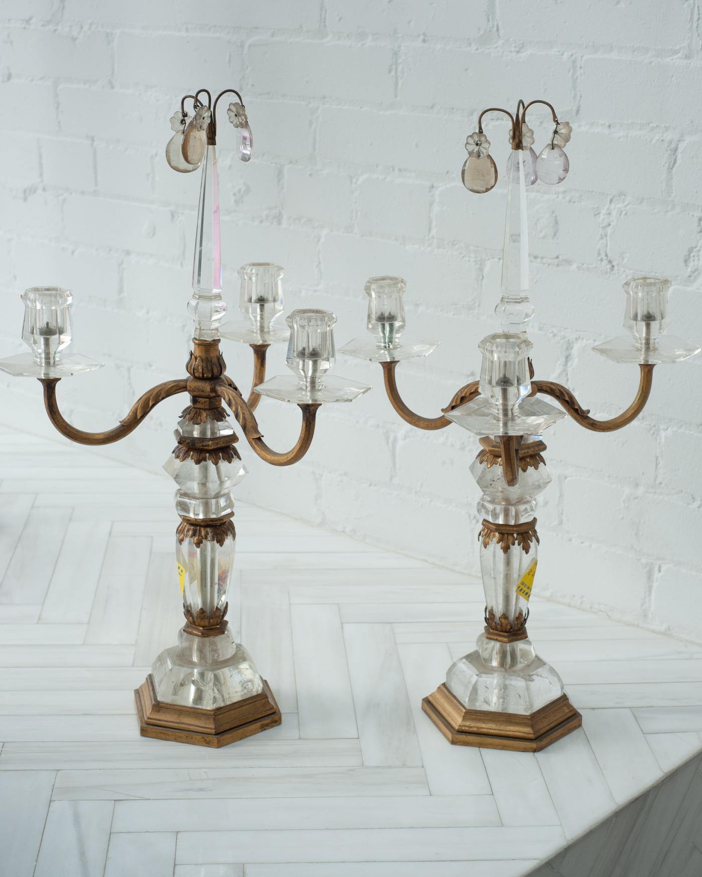 Incredibly rare and prized, these authentic antique rock crystal and bronze Maison Baguès candelabras are a statement in any interior. They are timeless and decadent.

Founded in 1860, Maison Baguès, specialized in the production of bronze light