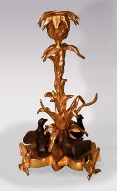 Coppia di candelabri in bronzo e ormolo della metà del XIX secolo