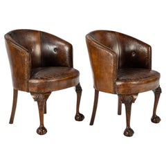 Antique pair of mid 19th century English Chippendale warm brown armchairs