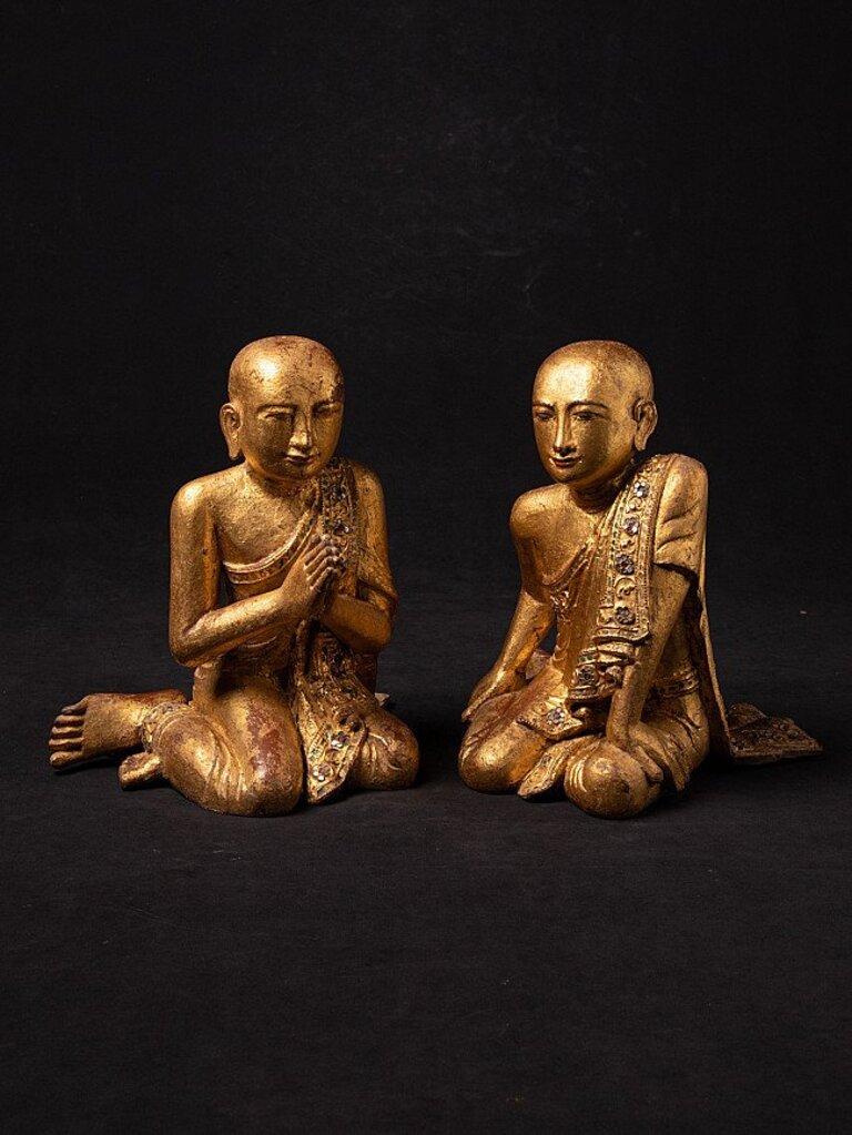 Material: wood
32,5 cm high 
30,5 cm wide and 26,3 cm deep
Weight: 4.95 kgs
Gilded with 24 krt. gold
Mandalay style
Namaskara mudra
Originating from Burma
19th century.
 