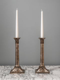 Antique pair of neoclassical candlesticks