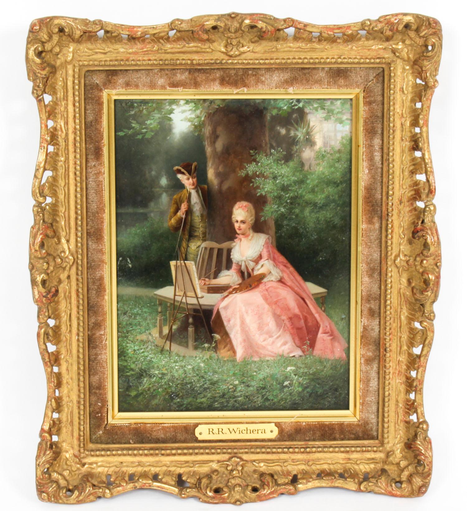 A lovely pair of Austrian oil on board framed paintings by Raimund Ritter Von Wichera, (1862-1925) both signed and circa 1890 in date.
The paintings delightfully present two pairs of courting couples in period costumes in beautiful garden