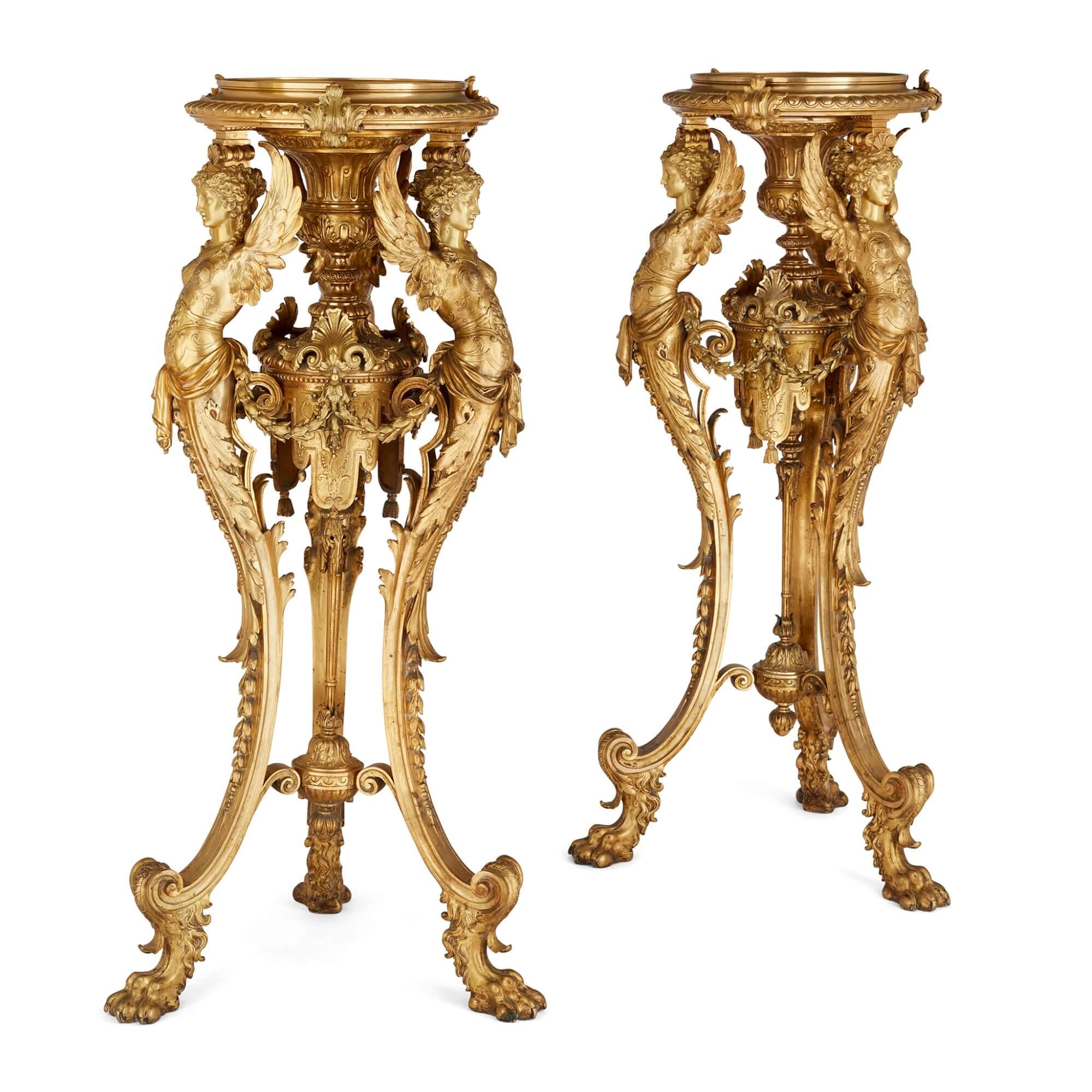 Antique pair of ormolu pedestals with Neo-Grec sphinx supports
French, Late 19th Century
Height 105cm, width 49cm, depth 49cm

Decorated with Neo-Grec and Rococo style elements, this stunning pair of pedestals are impressively crafted from