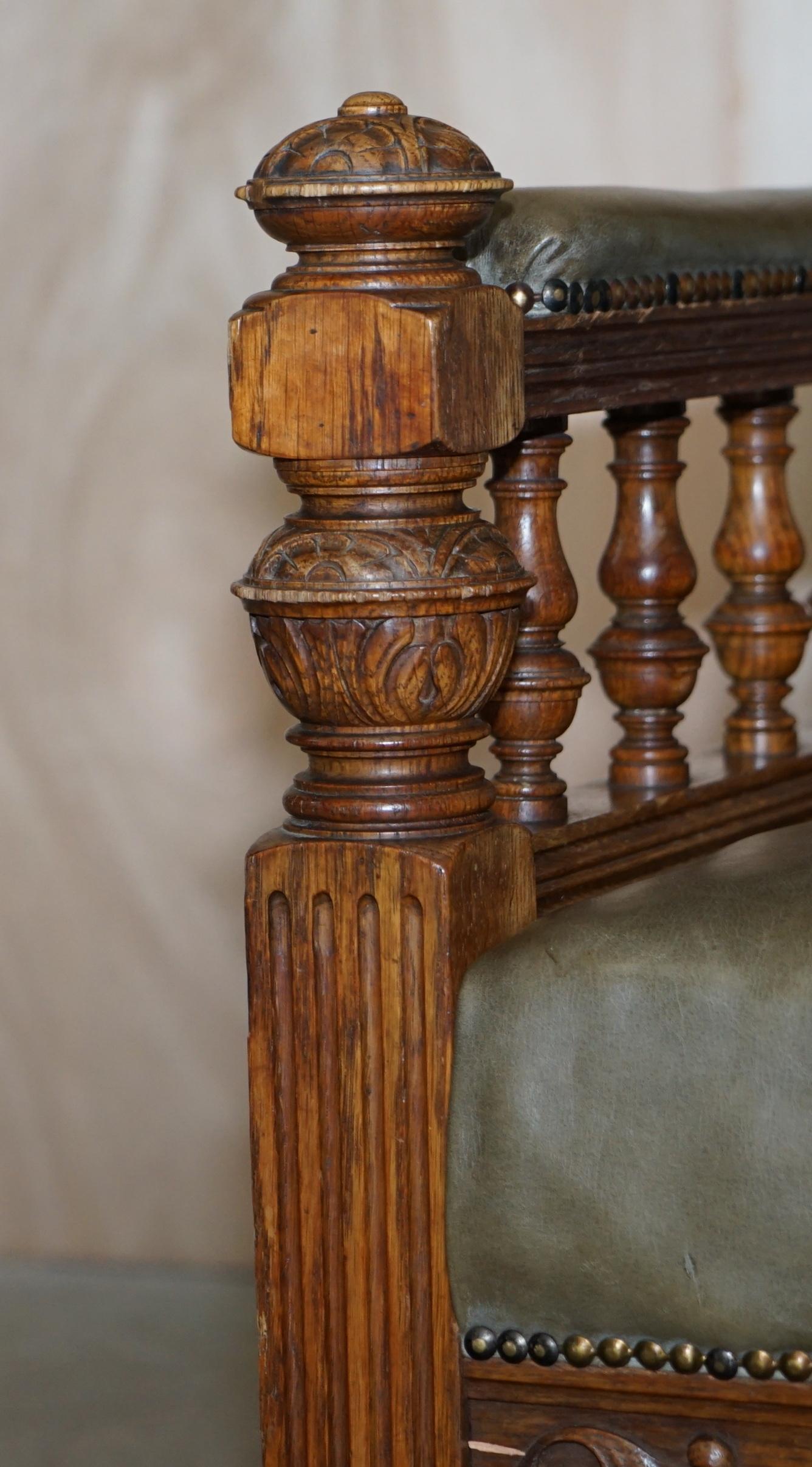 Antique Pair of Ornately Carved Oak Framed Leather Victorian Throne Armchairs For Sale 6