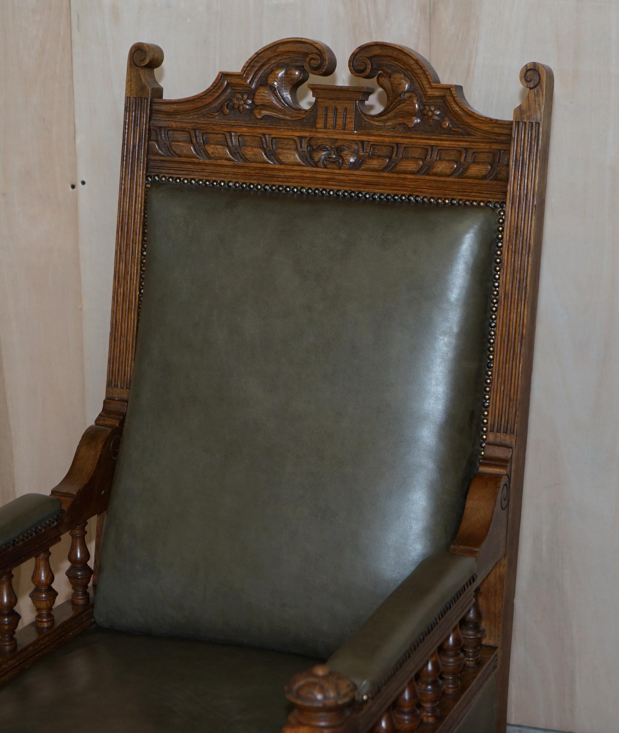Hand-Crafted Antique Pair of Ornately Carved Oak Framed Leather Victorian Throne Armchairs For Sale