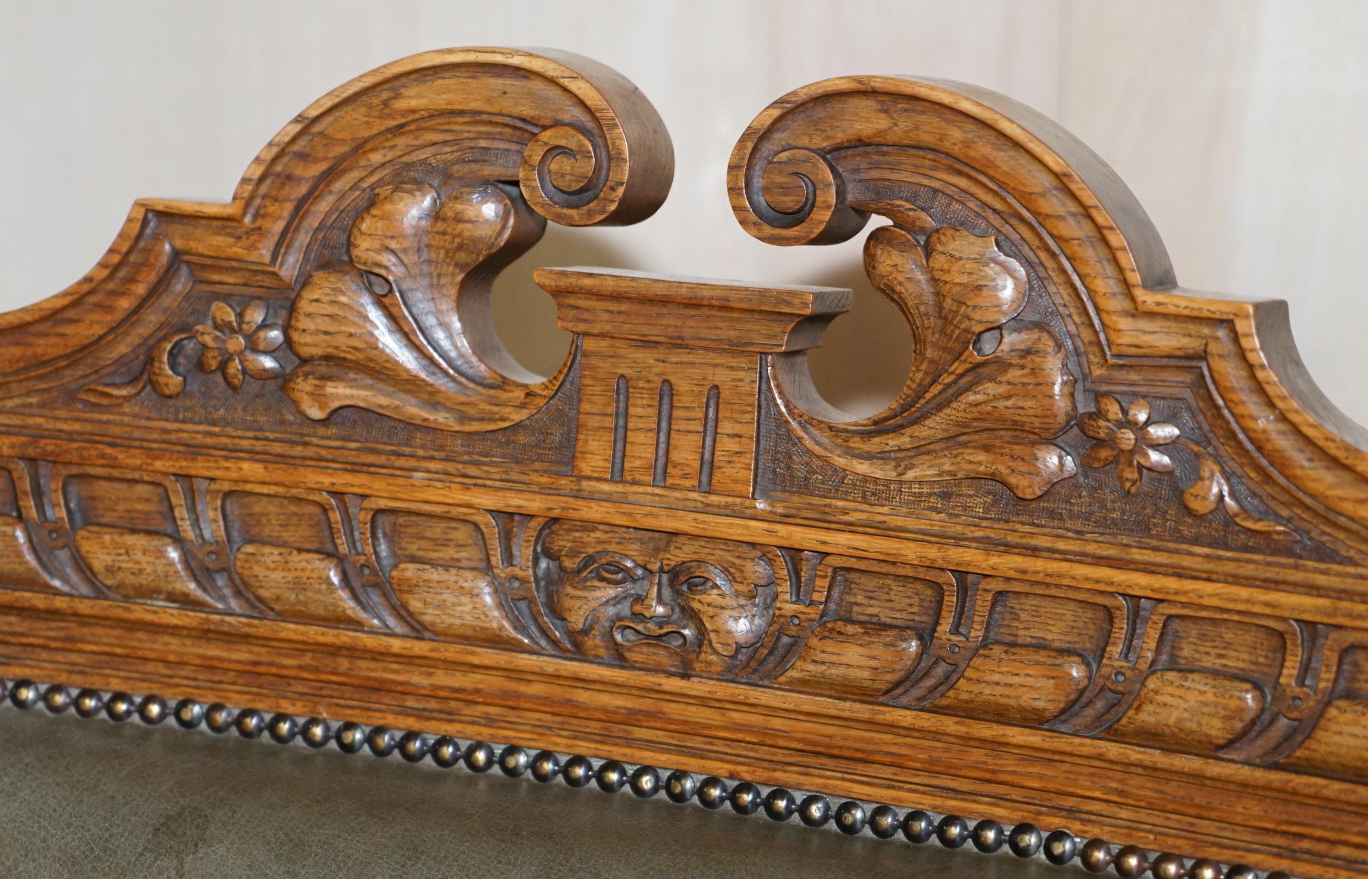 Antique Pair of Ornately Carved Oak Framed Leather Victorian Throne Armchairs For Sale 1