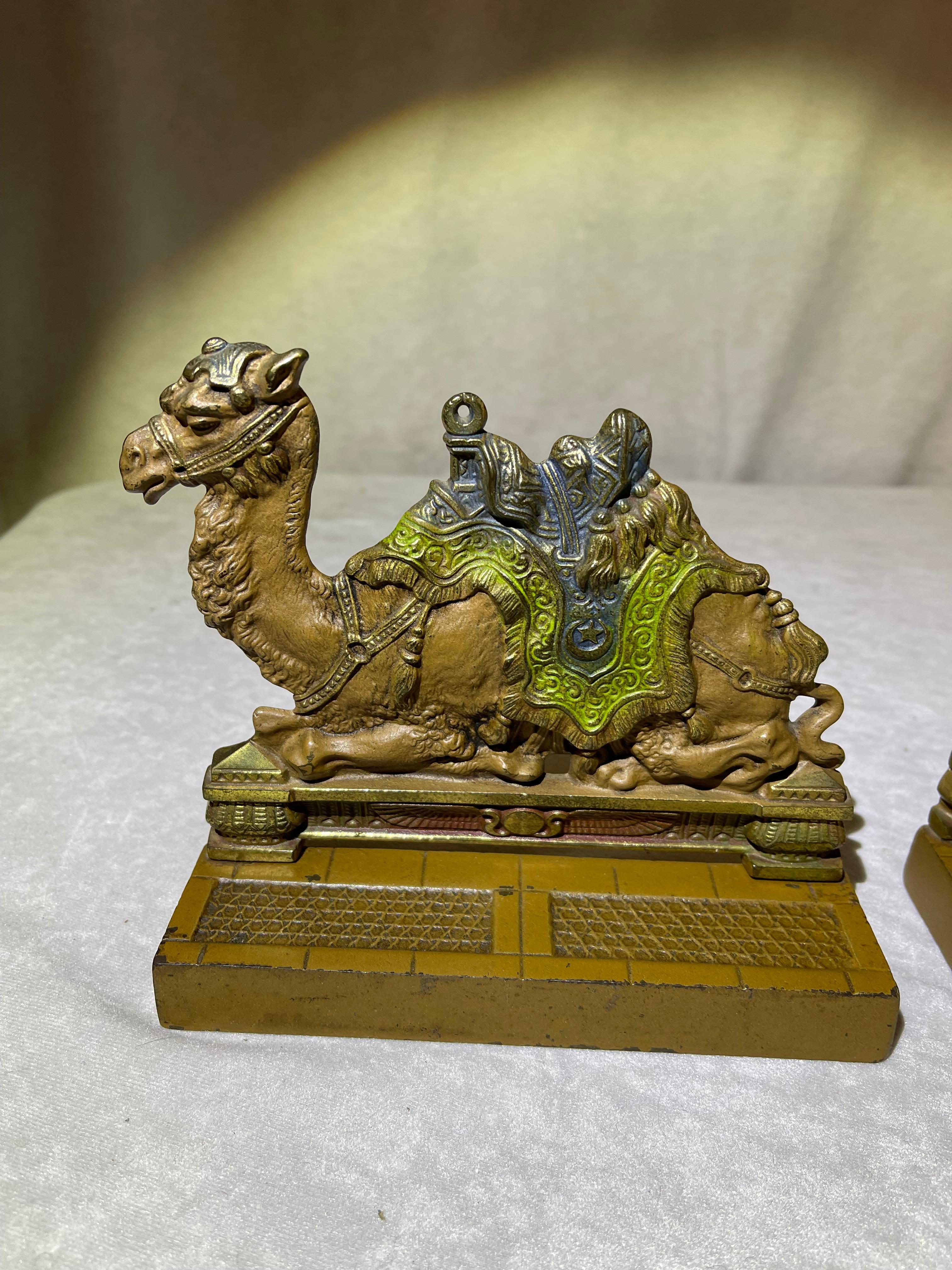 This incredible pair of cast iron bookends can only be made by the Judd Company. Superb detailed castings, realistic factory paint and fine work all around are all present here. These are pictured in the original Judd Company catalog. These are very