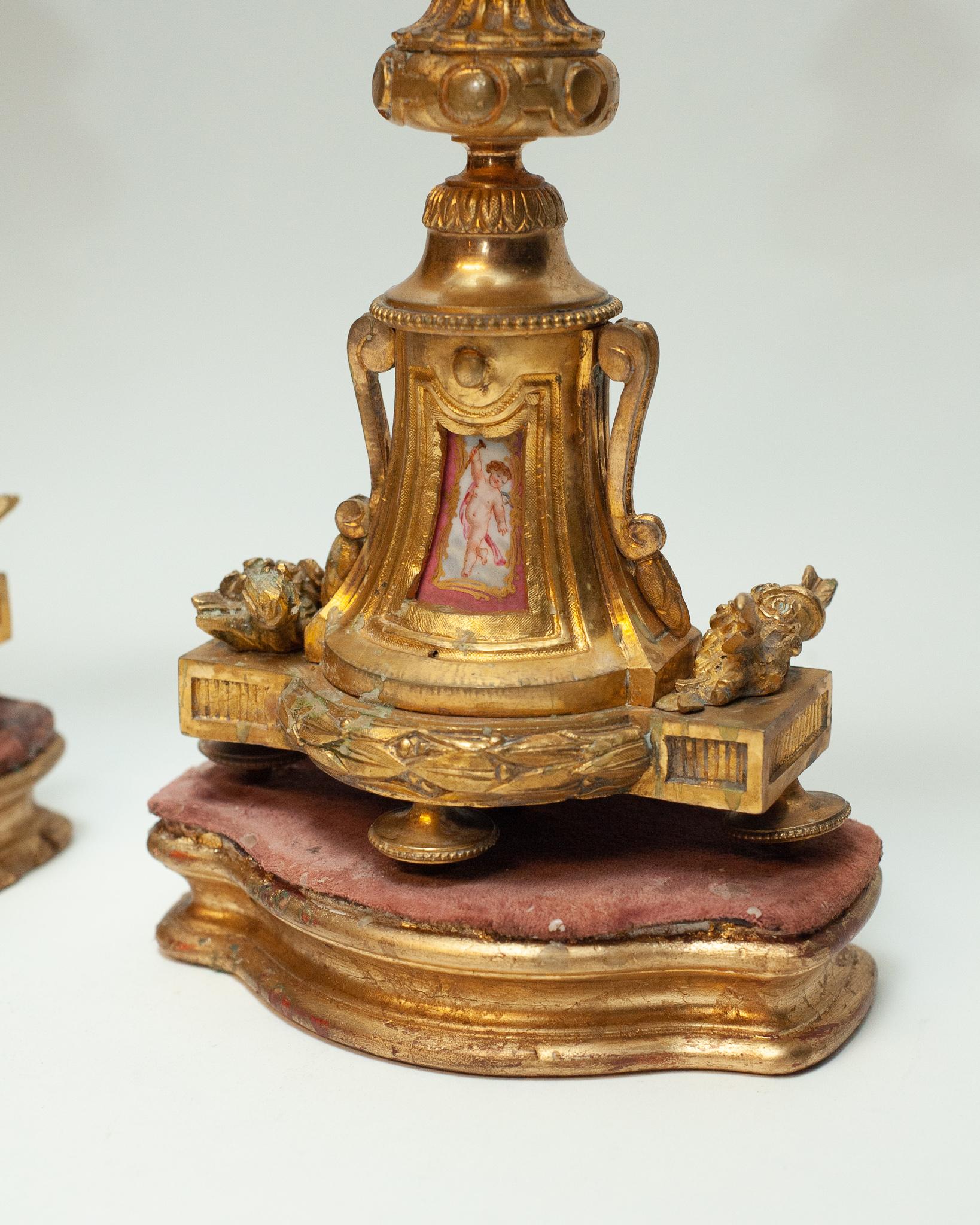 French Antique Pair of Pink Porcelain and Bronze Candlesticks with Gilt Wood Base For Sale