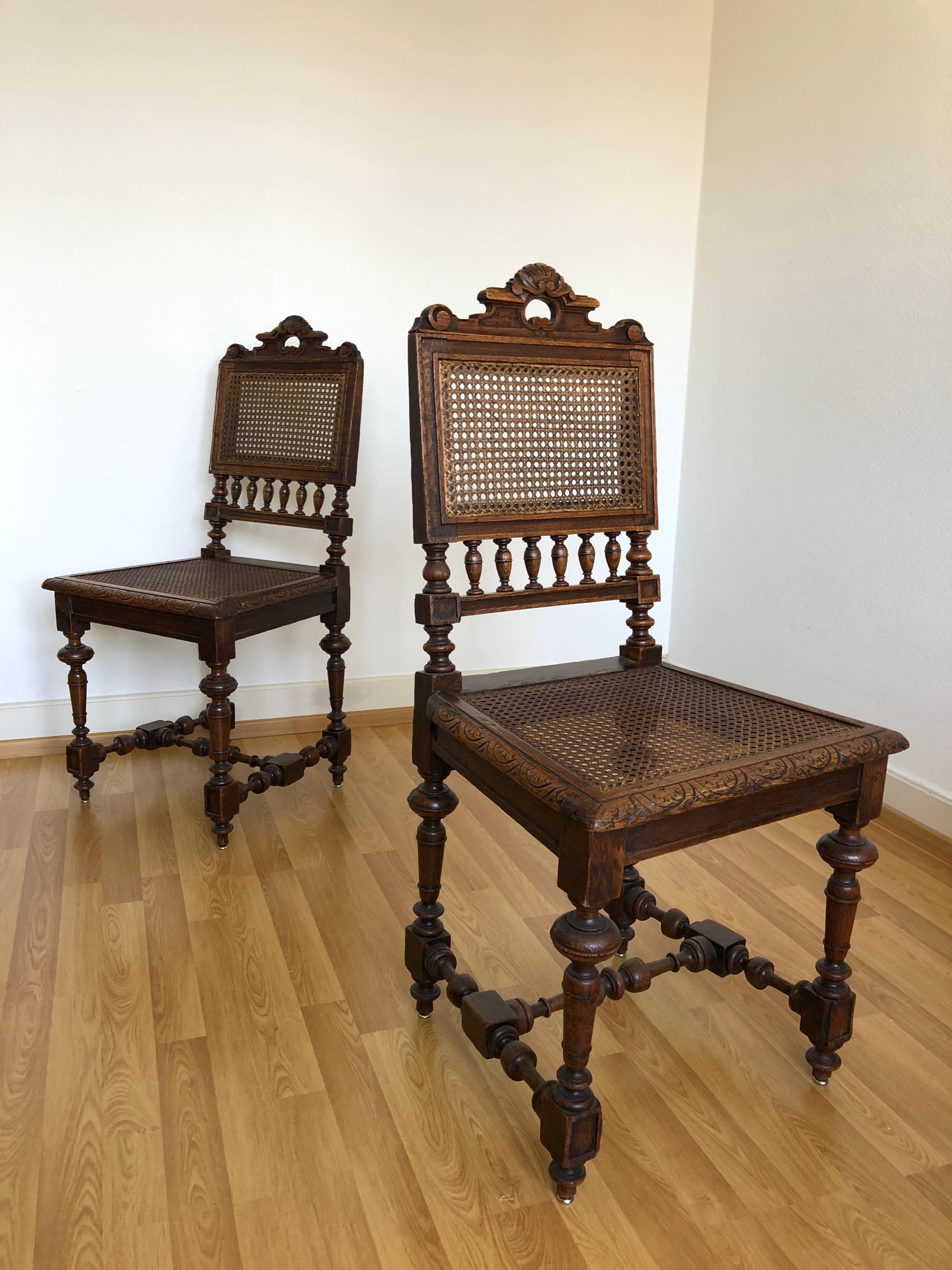 Stunning two antique 19th century Renaissance Revival carved oak barley cane side chairs finely carved barley twist legs, cane seat and backrest.
Complimentary Shipping Worldwide 
 
