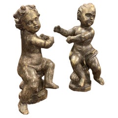 Antique Pair of Sculptures, Cherubs Silvered and Gilded Wood, 18th Century Italy