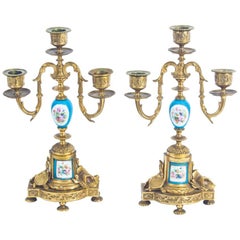 Paire de candélabres anciens Svres en porcelaine bleu céleste et bronze doré du 19ème siècle