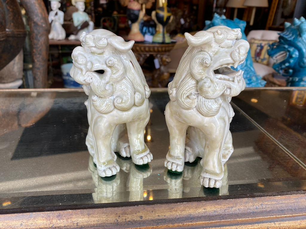 This pair of Shi Shi dogs are glazed male and female with tongues out well modeled in 