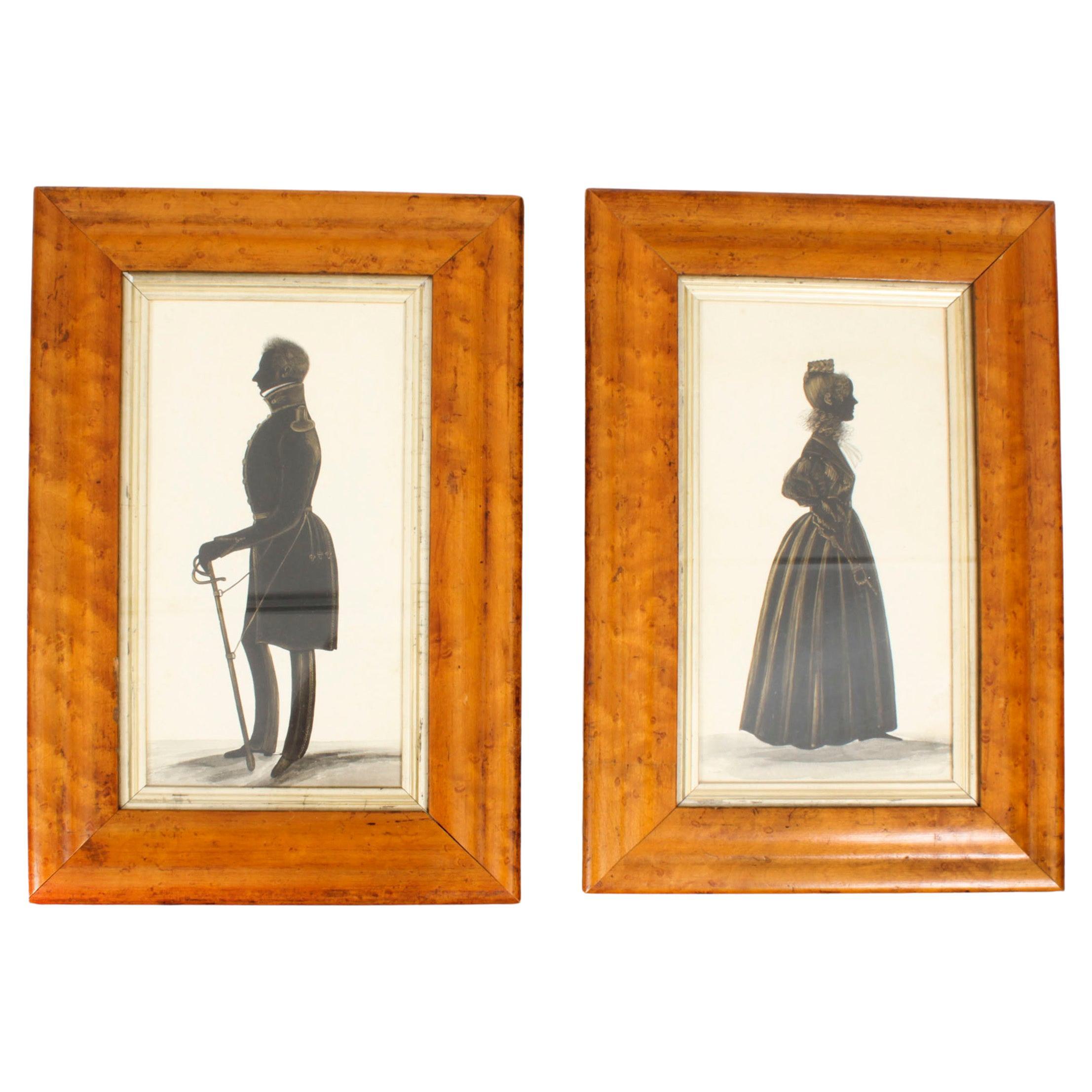 Pareja antigua de retratos silueteados Marcos de arce ojo de pájaro Siglo XIX
