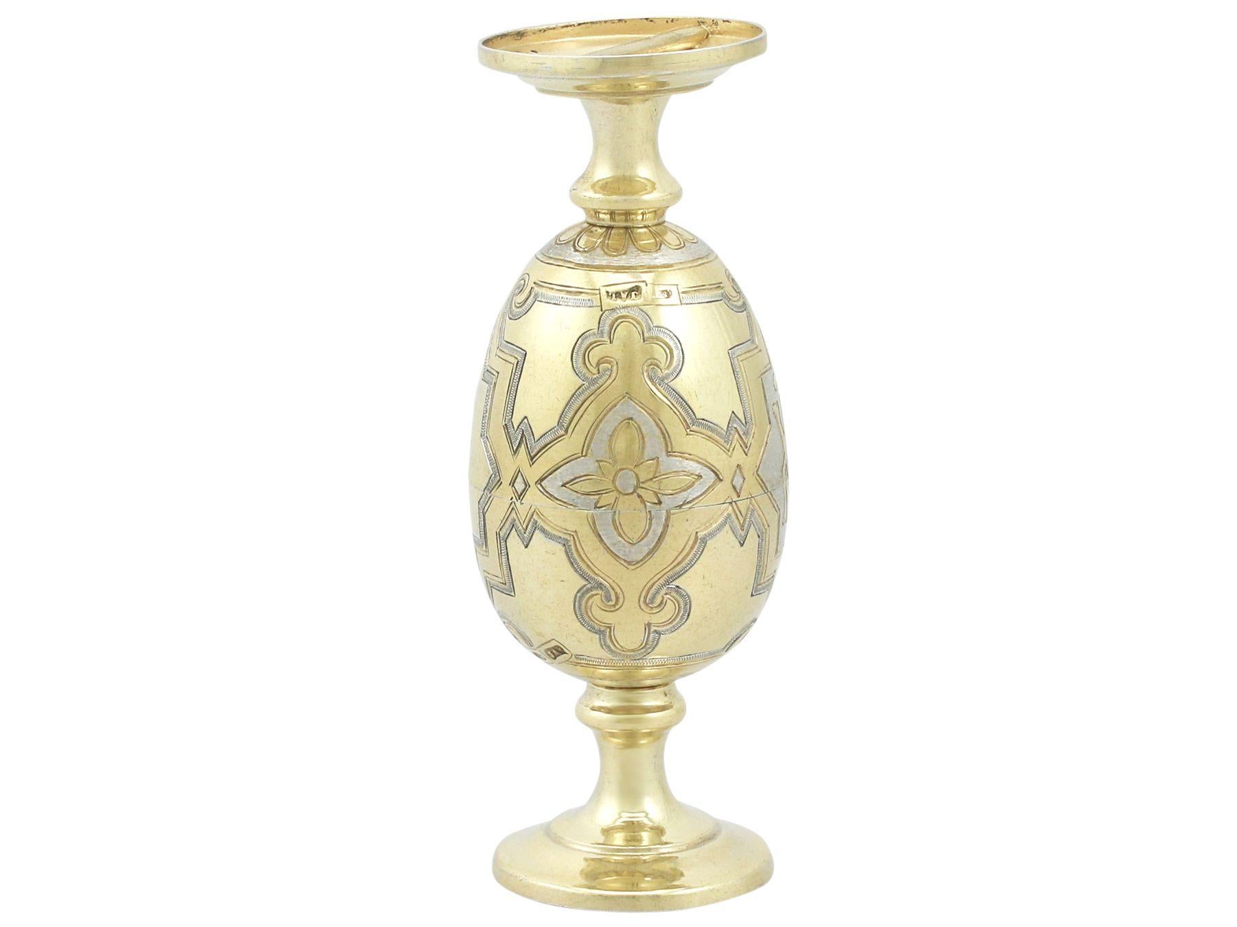 An exceptional, fine and impressive pair of antique Russian silver gilt egg cups; an addition to our silver cruet and condiment collection.

These exceptional antique Russian silver egg cups have a circular rounded form to a swept pedestal