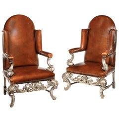 Antique Pair of Silver Gilt Leather Upholstered Wing Chairs