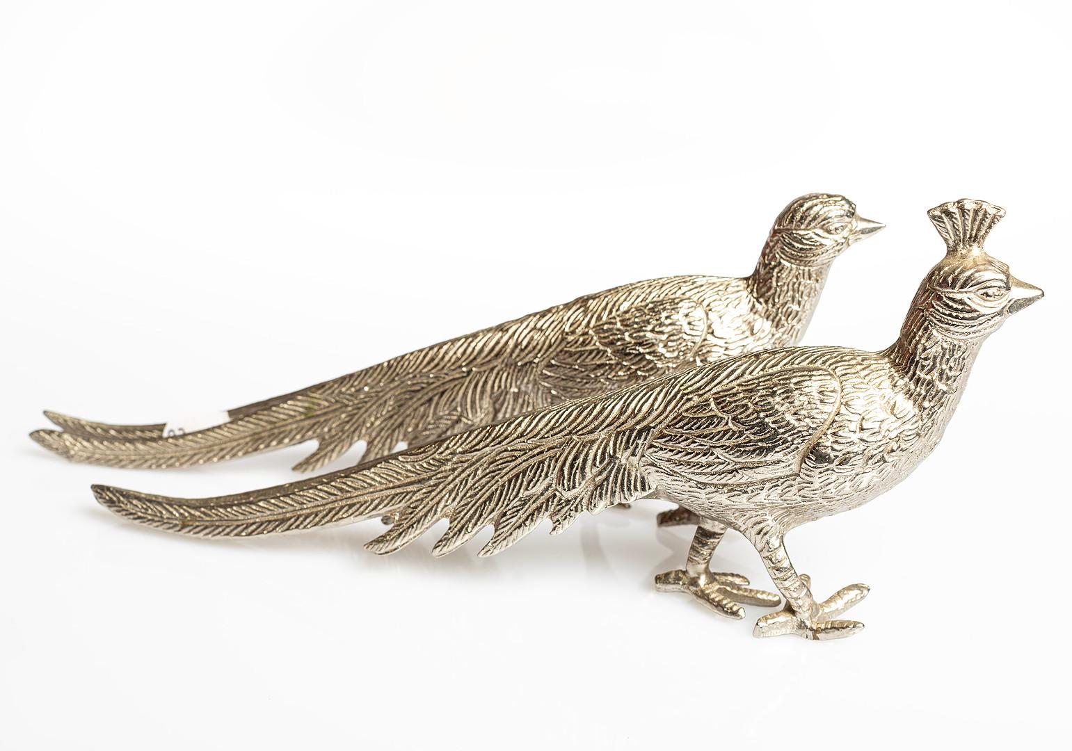 A Pair of Artistically created birds for table decor, silver-plated peacocks - ideal for a coffee table or bookends. These figures are Classic Hollywood Regency! They are each unique from one another, with slightly different positions and physical