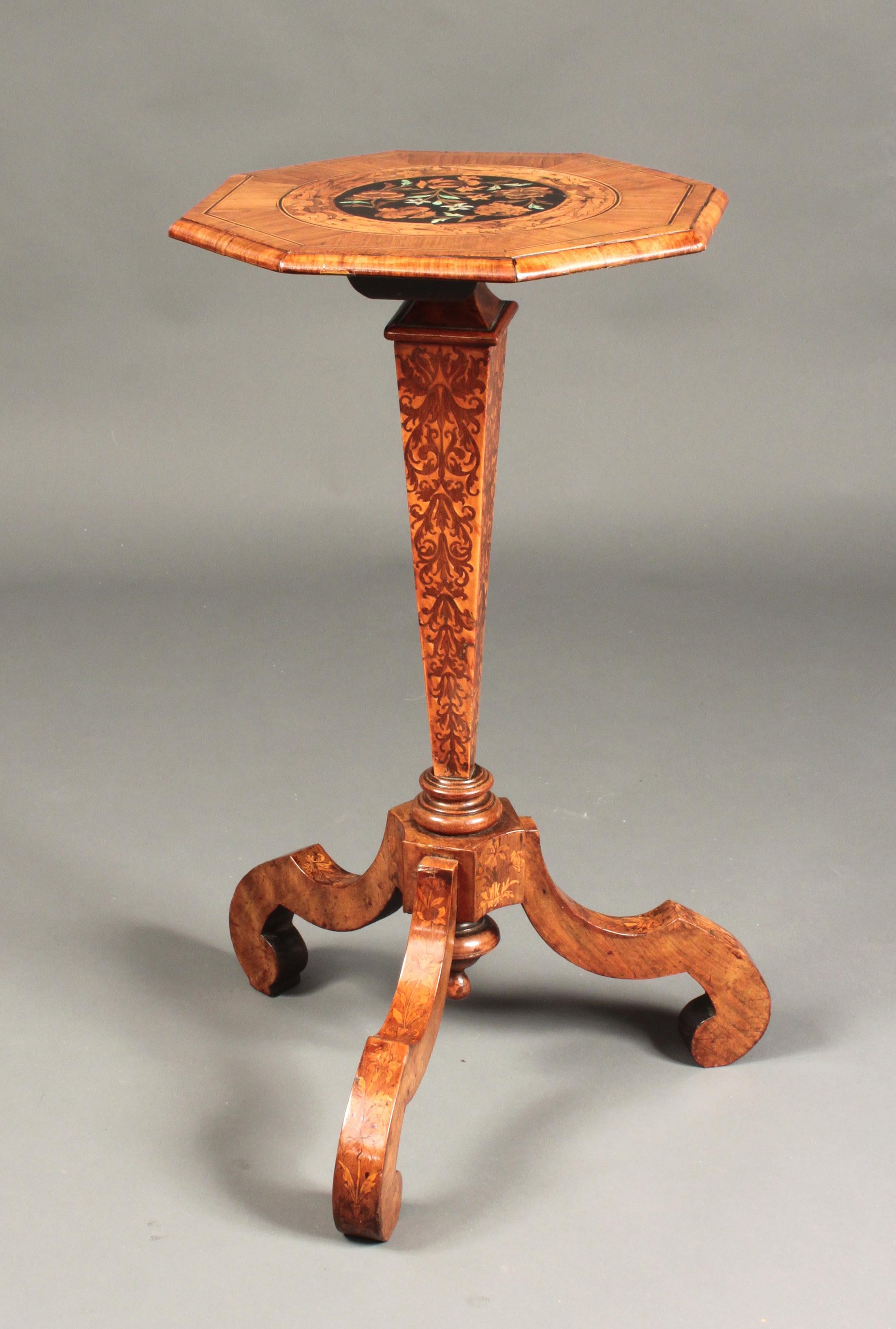 An attractive pair of 19th century Dutch walnut marquetry occasional tables; probably formerly torcheres.

 