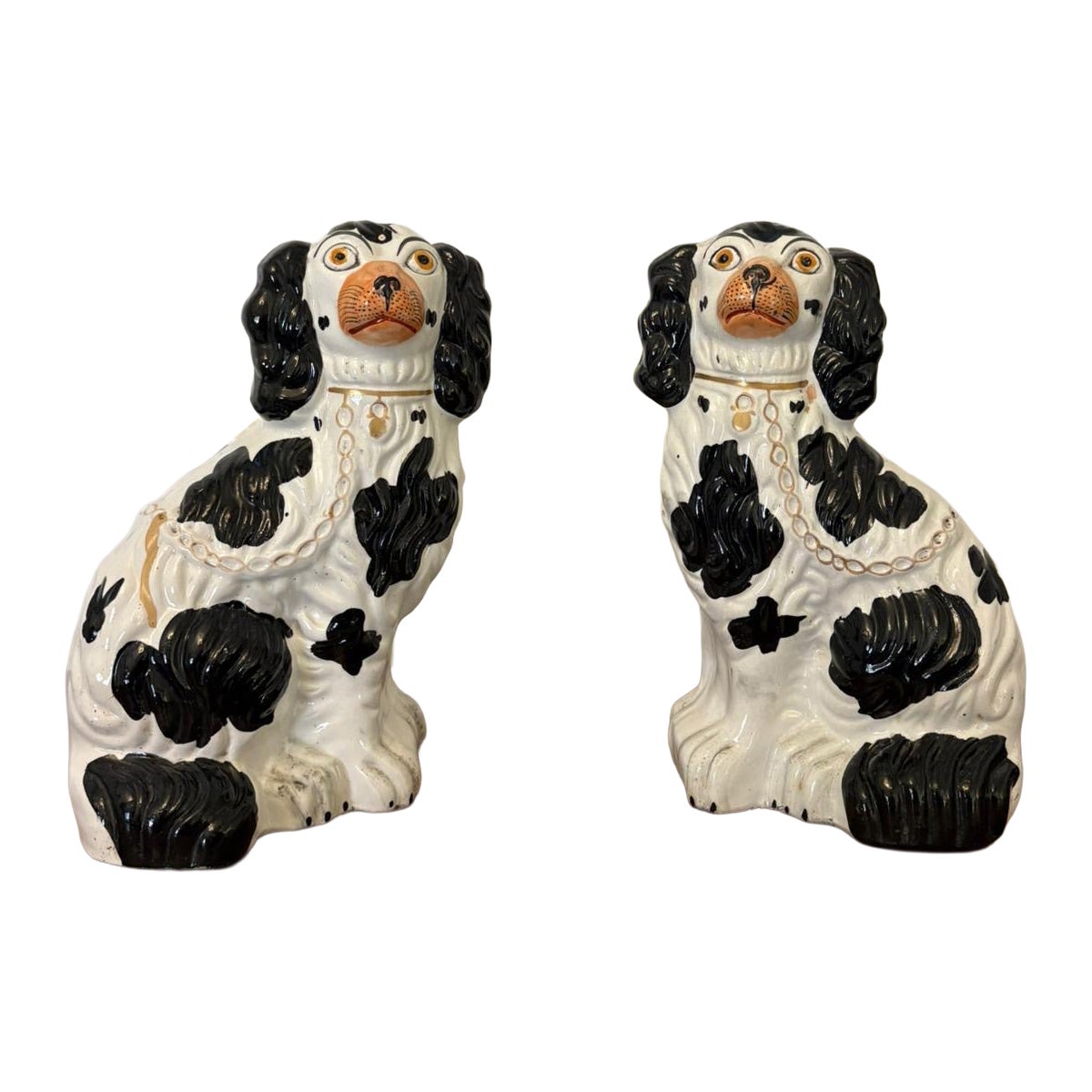 Antique Pair of Staffordshire Black
White Spaniel Dogs