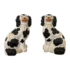 Antique Pair of Staffordshire Black
White Spaniel Dogs