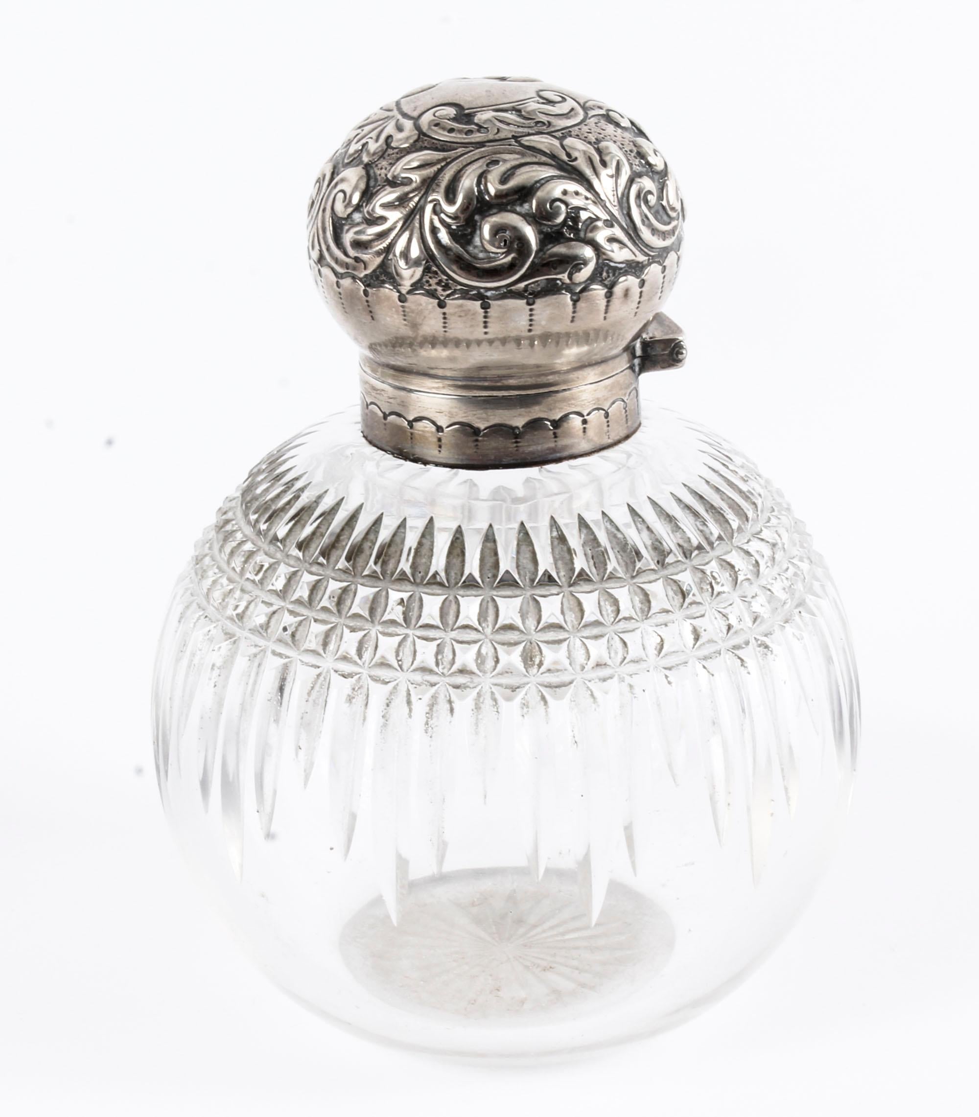antique perfume bottles with silver tops