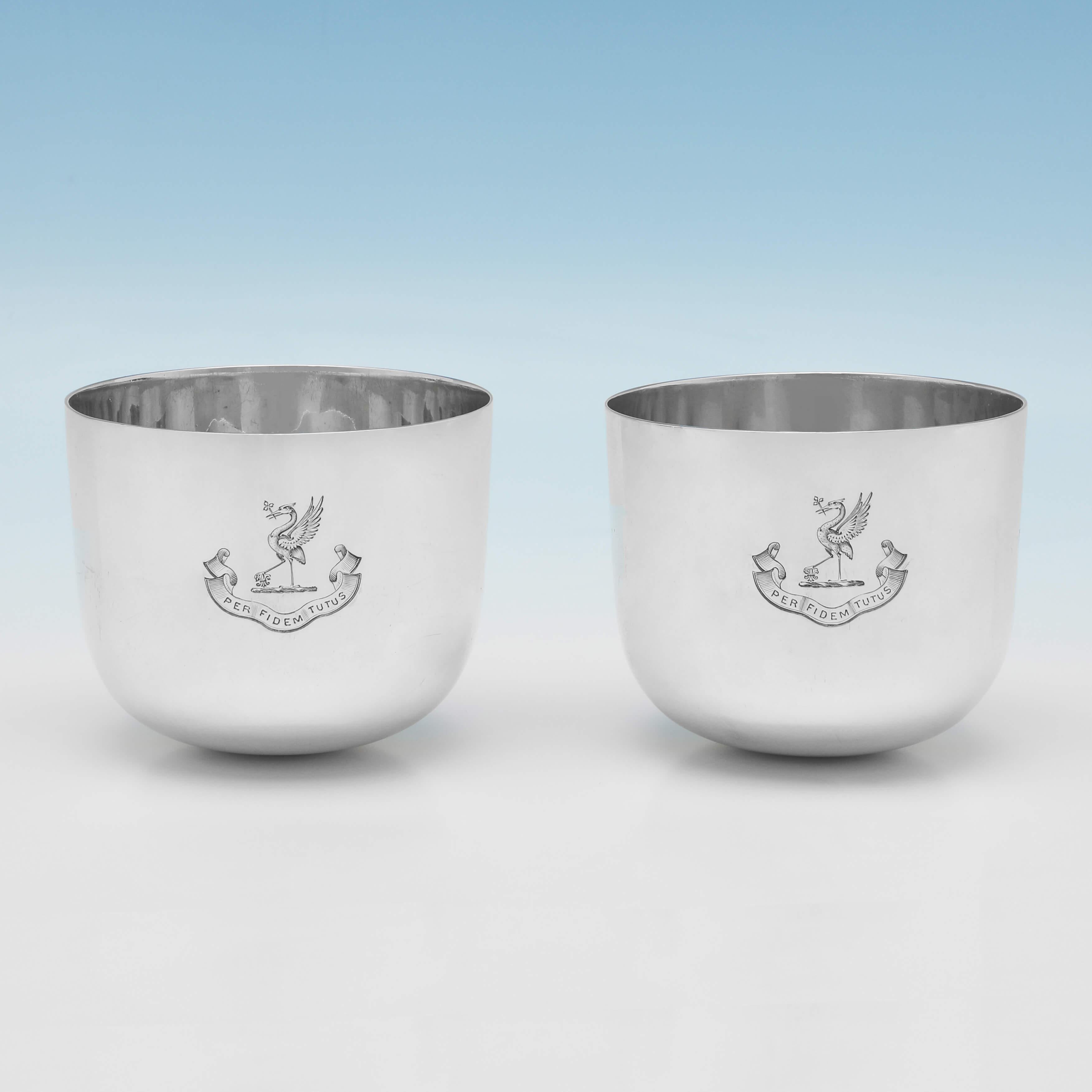 Hallmarked in Sheffield in 1913 by Hawksworth Eyres & Co., this very handsome, Antique Sterling Silver Pair of Tumbler Cups, are presented in their original box, and are both engraved with a crest and motto. Each tumbler cup measures 2.5