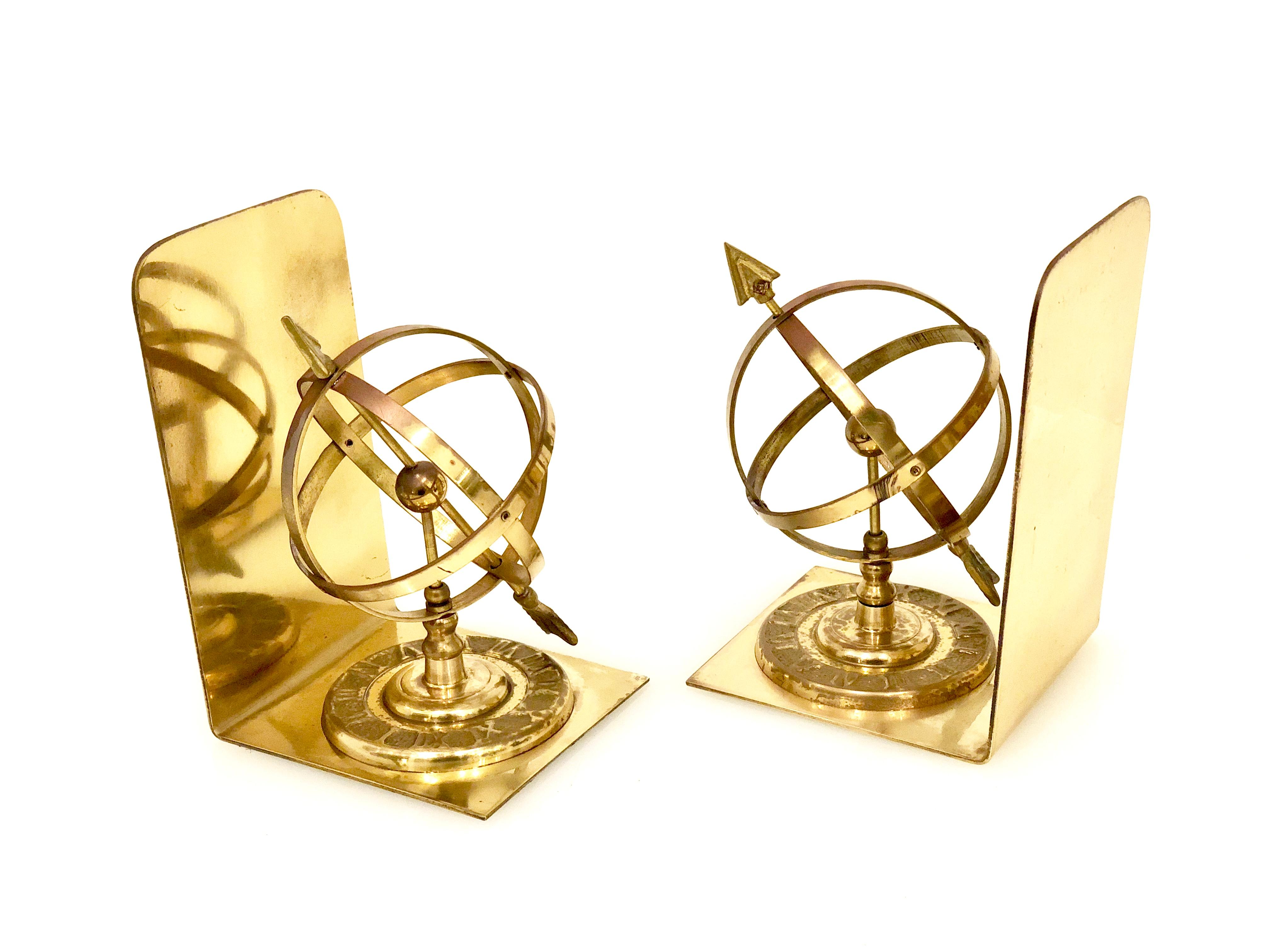 Vintage pair of solid patinated brass bookends with a sundial motif.