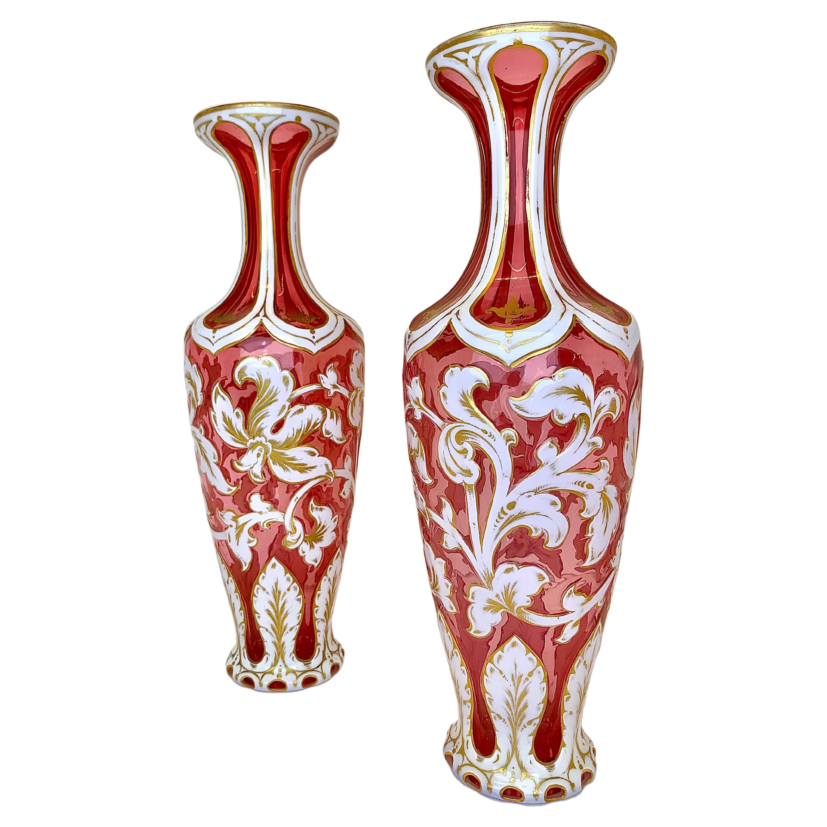 A Fine Pair of Antique Bohemian Vases in Cranberry Glass and Milky White Opaline Overlay

Both Layers of Glass are Deorated with Hand-painted Gilding Highlights

Fine Example of the Highest Quality 19th Century Bohemian Glass Artists