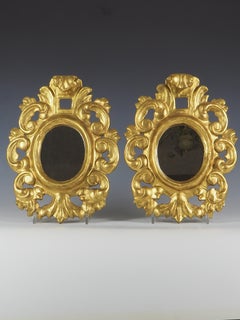 Coppia di specchi da parete in legno dorato veneziano