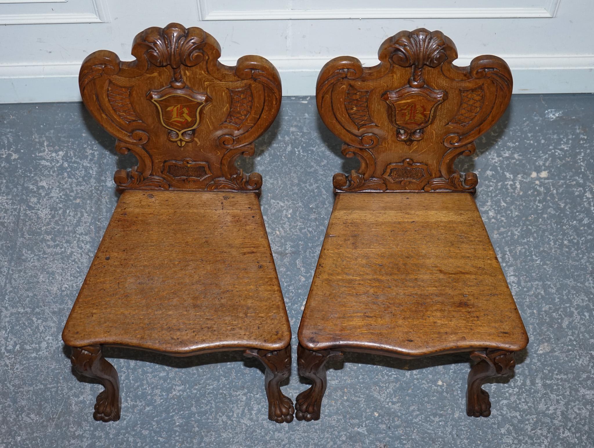 

Antiques of London


A striking pair of Victorian solid oak carved hallway chairs, beautifully hand-crafted in the late 19th century. These chairs are rich with Gothic revival character and display the exceptional quality of Victorian