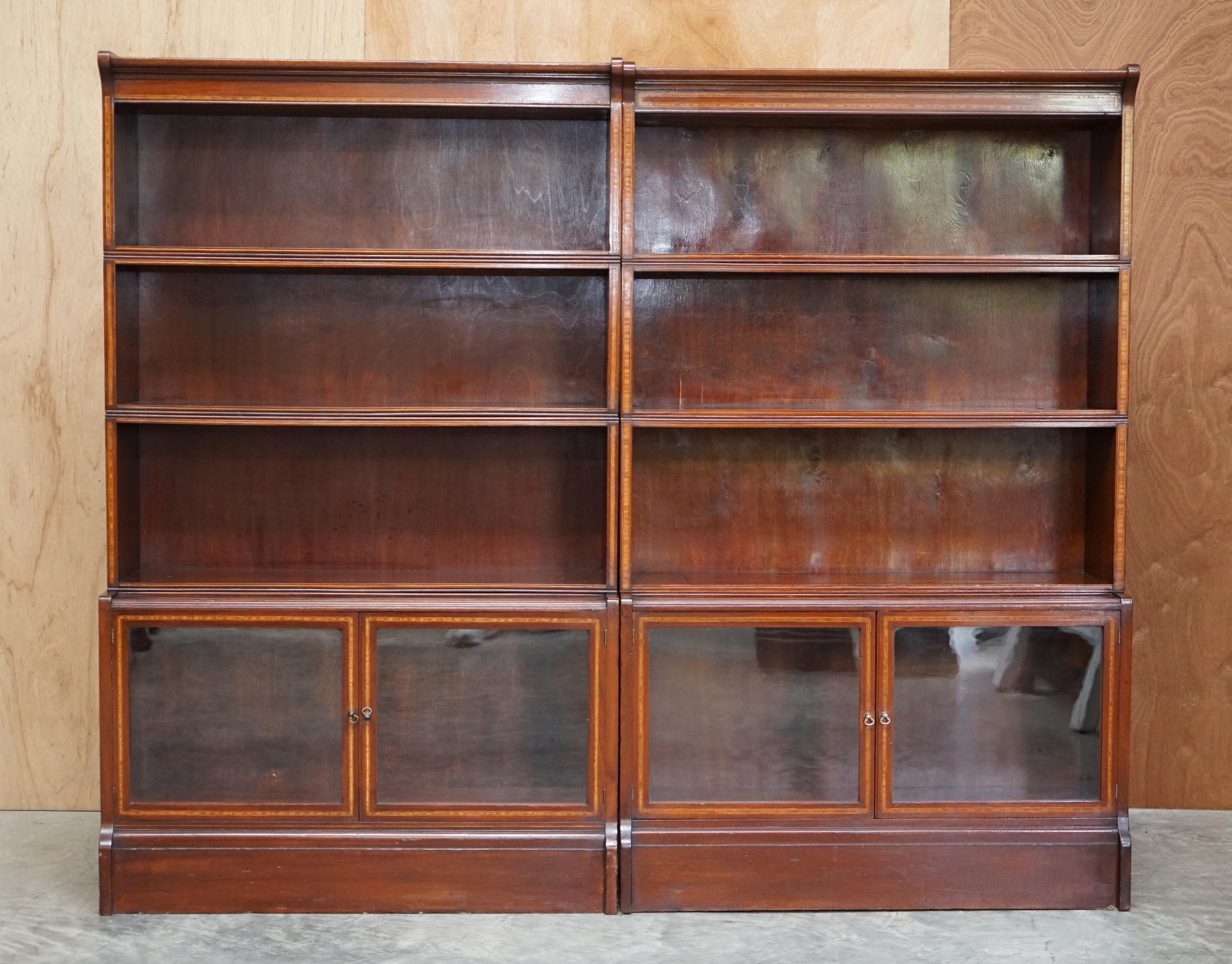 We are delighted to offer for sale this lovely pair of very rare original William Baker & Co Ltd “The Oxford” legal Library stacking bookcases

This are pretty much the finest pair of these bookcases I have seen, they are in a rich warm mahogany