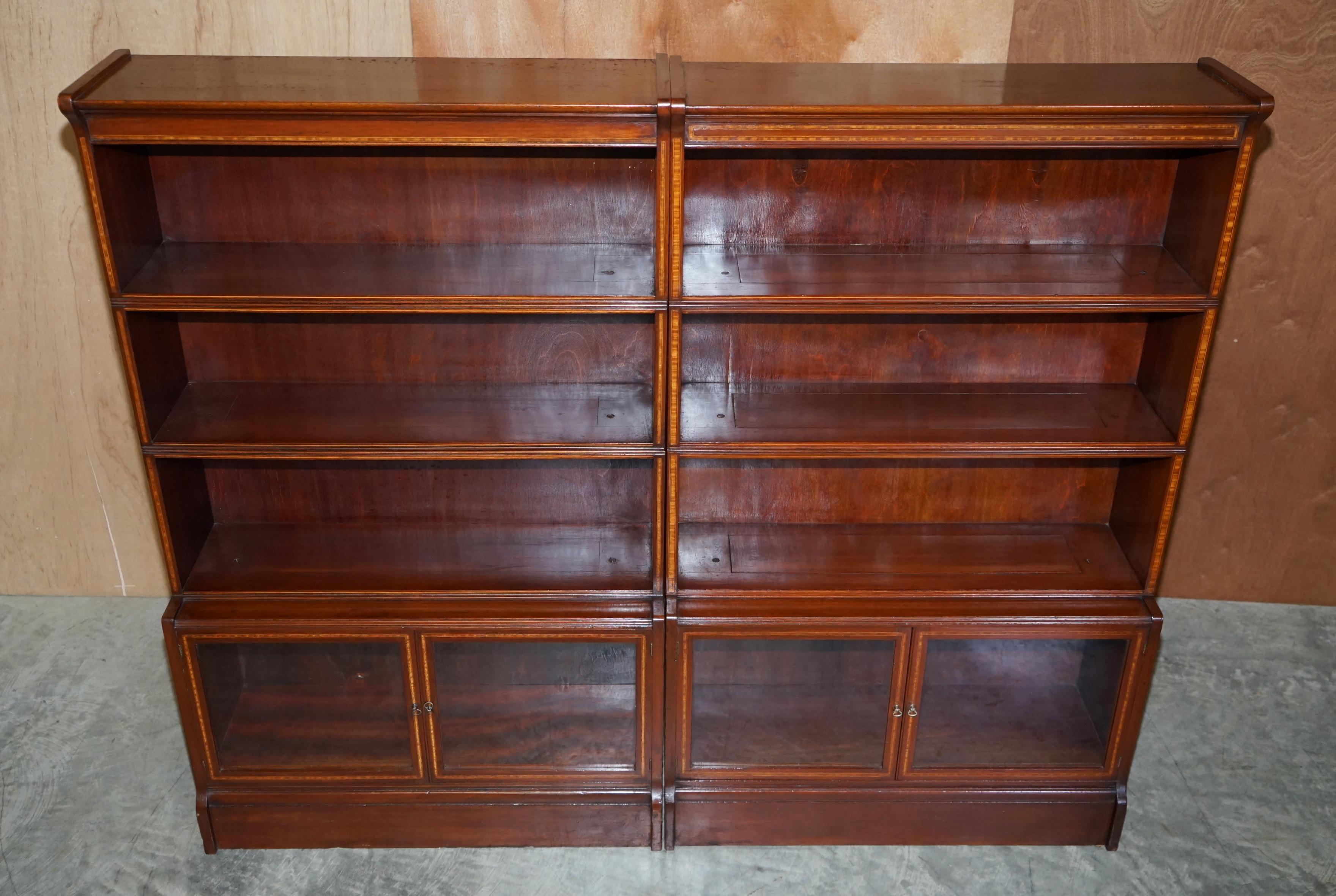 Hand-Crafted Antique Pair of William Baker Co Hardwood Satinwood & Walnut Legal Bookcases For Sale