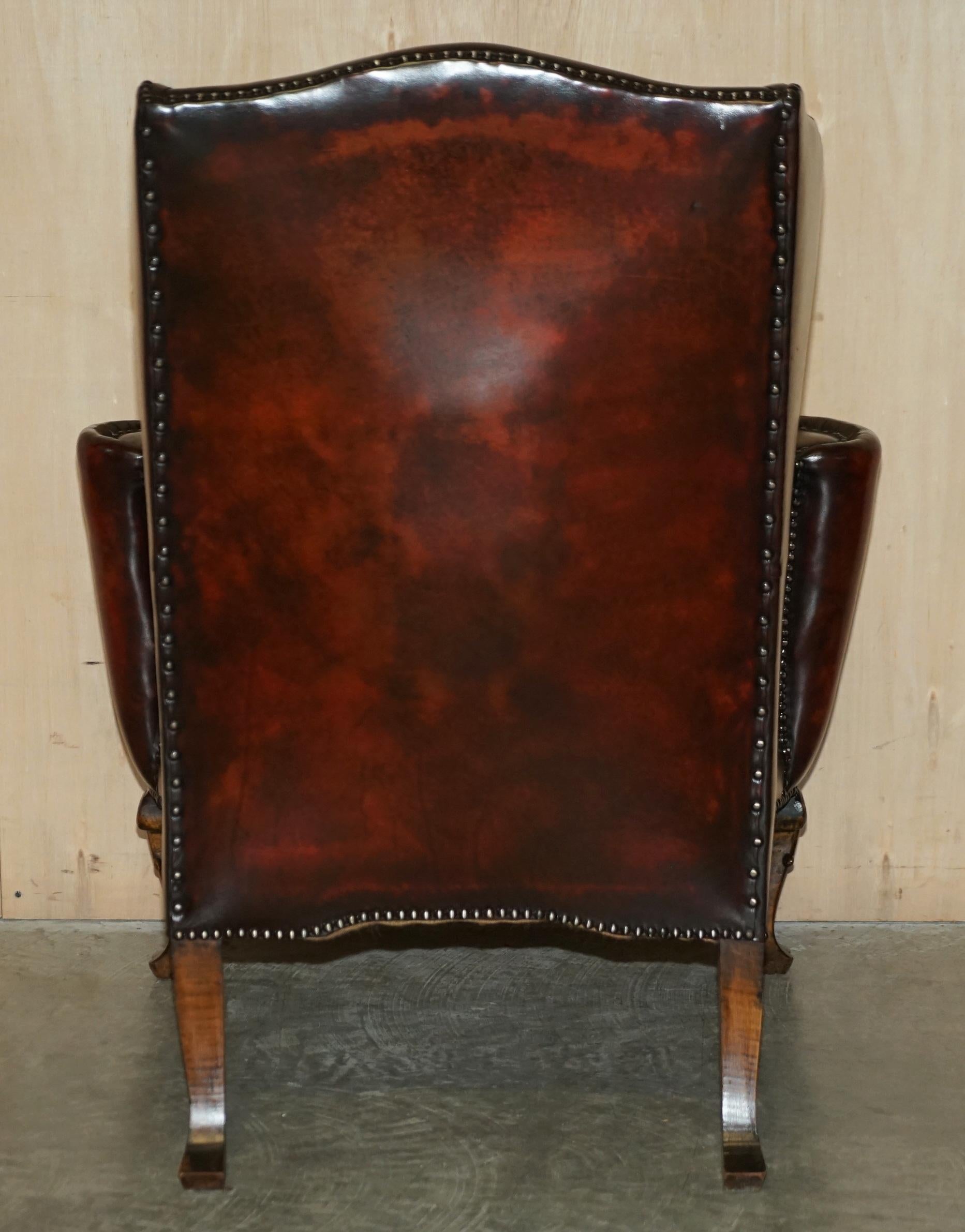 Antique Pair of William Morris Carved Legged Wingback Bordeaux Leather Armchairs 8