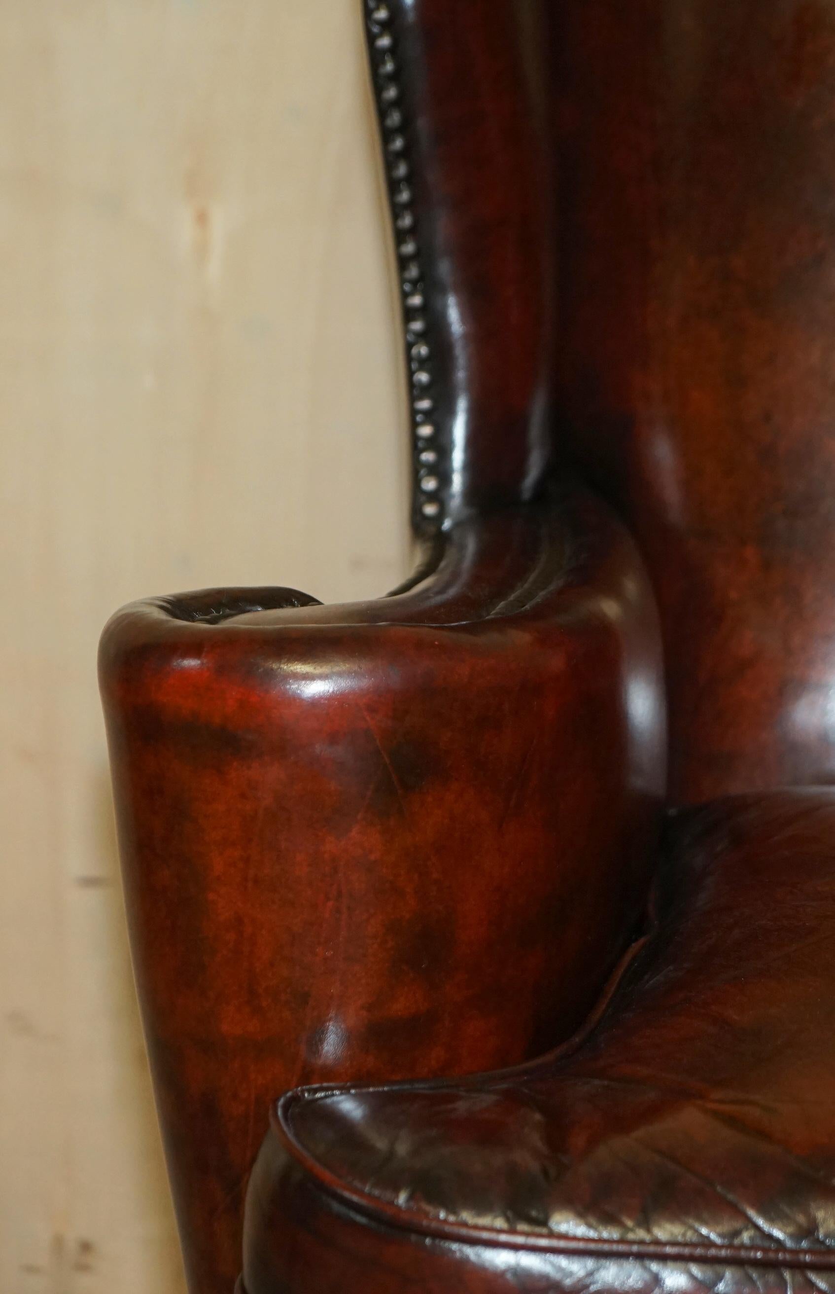 Antique Pair of William Morris Carved Legged Wingback Bordeaux Leather Armchairs 1