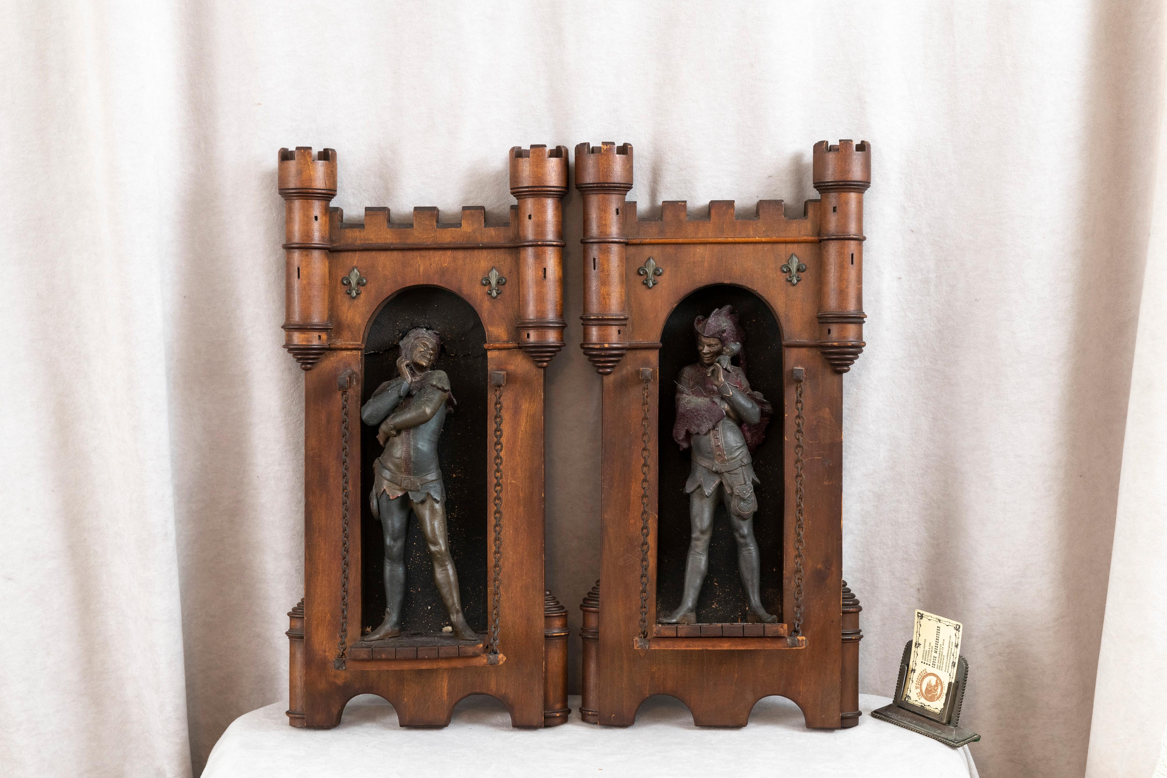 This is not your typical wall hanging art. They are very 3 dimensional, and not resembling plaques, as you can see. We have a nicely carved wood and cast metal medieval scene. The 2 metal figures stand on a carved wood ledge resembling a portion of