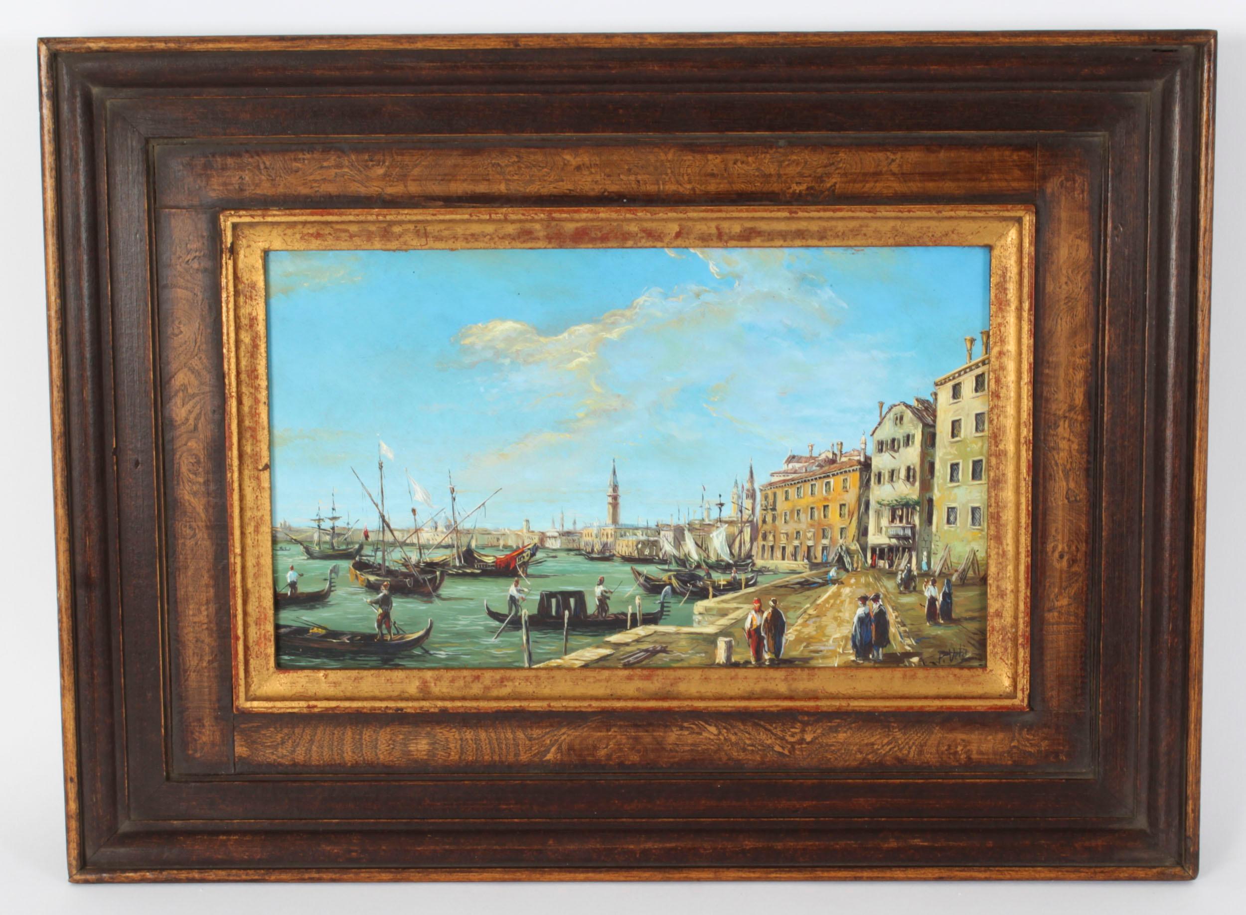 This is a beautiful pair of oil on board Continental School paintings of views of the Grand Canal in Venice, signed P. Veta, circa 1890 in date.

This beautiful pair of paintings capture striking views of the Grand Canal and both feature busy