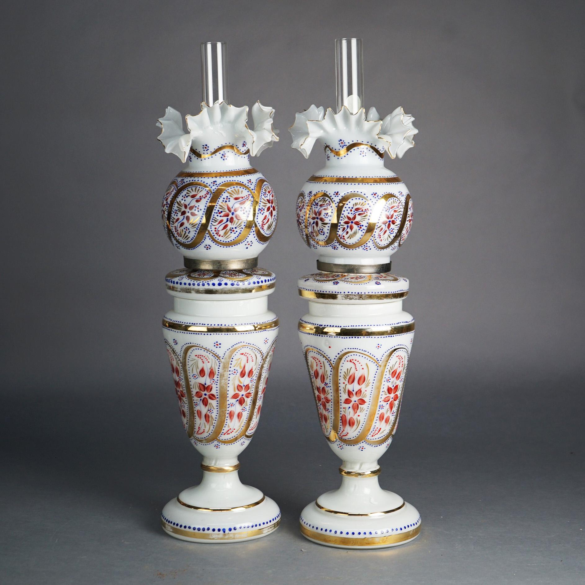 Antique Matching Pair of Opaline Floral Enameled Hand Painted & Gilt Oil Lamps with Handkerchief Shades, c1890

Measures- 27.5''H x 7''W x 7''D
