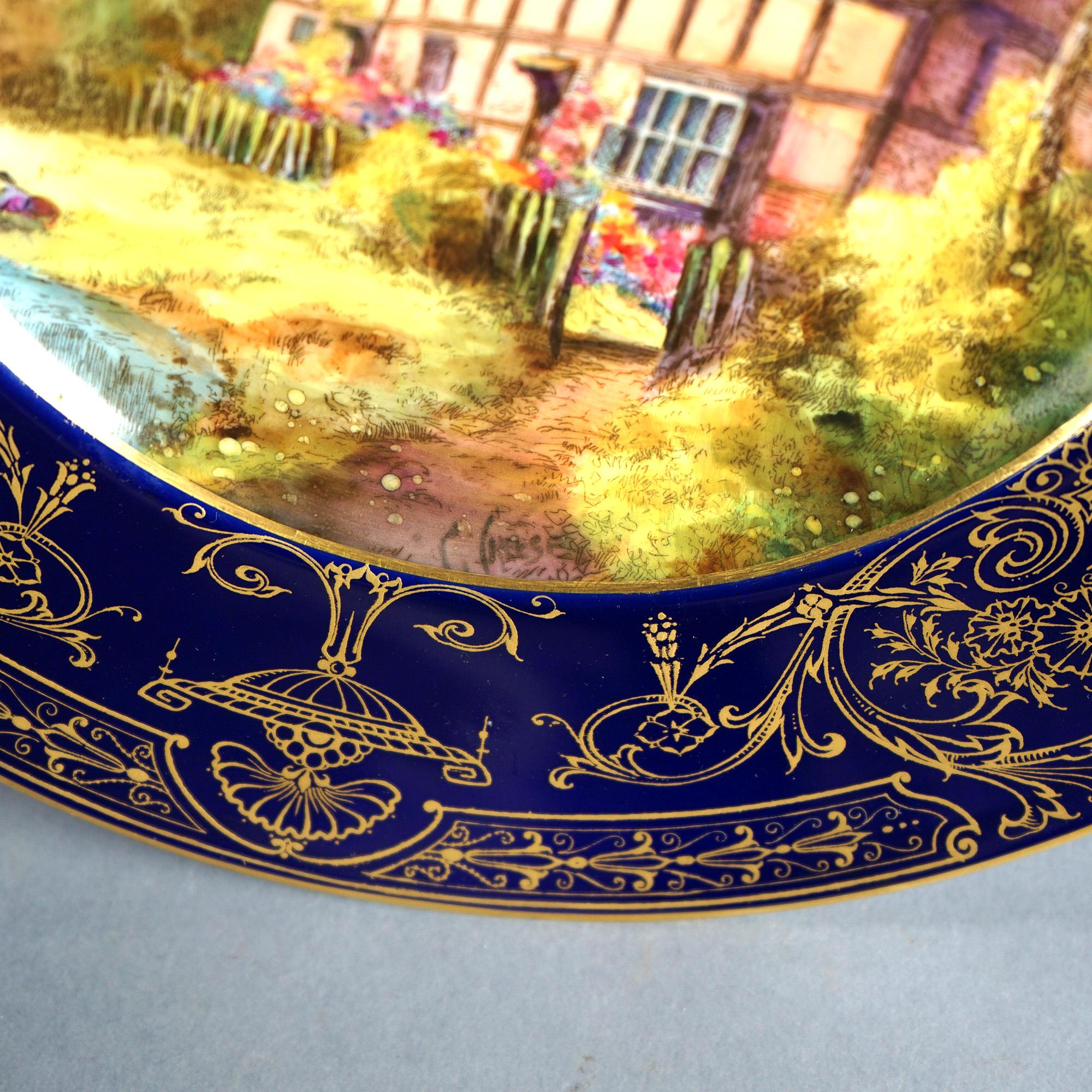 20ième siècle Ancienne paire d'assiettes scéniques anglaises en porcelaine Royal Worcester peintes à la main C1910