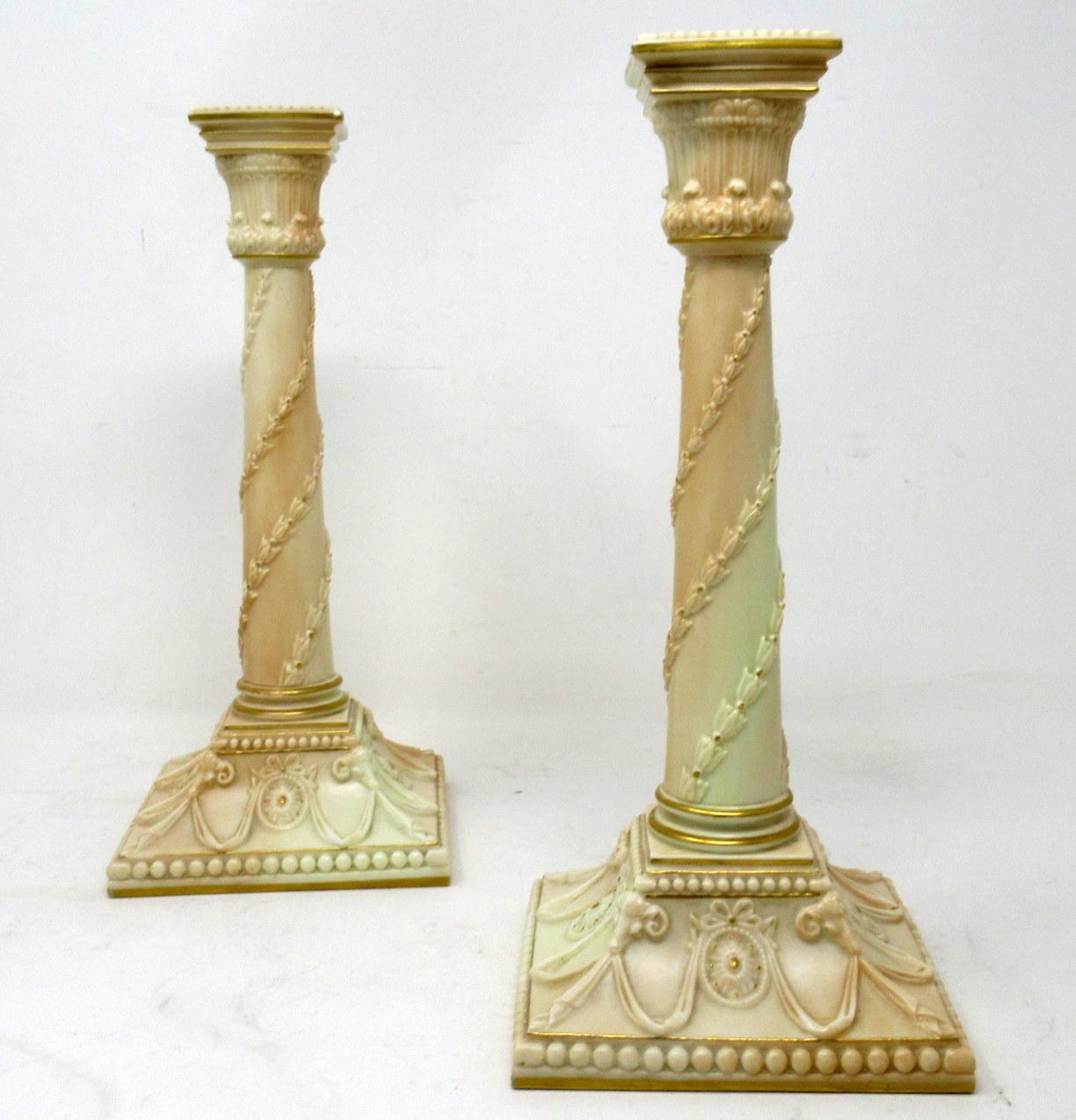 An exceptionally fine pair English porcelain Royal Worcester Corinthian column single light candlesticks of Museum quality. Last quarter of the nineteenth century. 

Each central column with bell shaped swag decoration, ending on a spreading