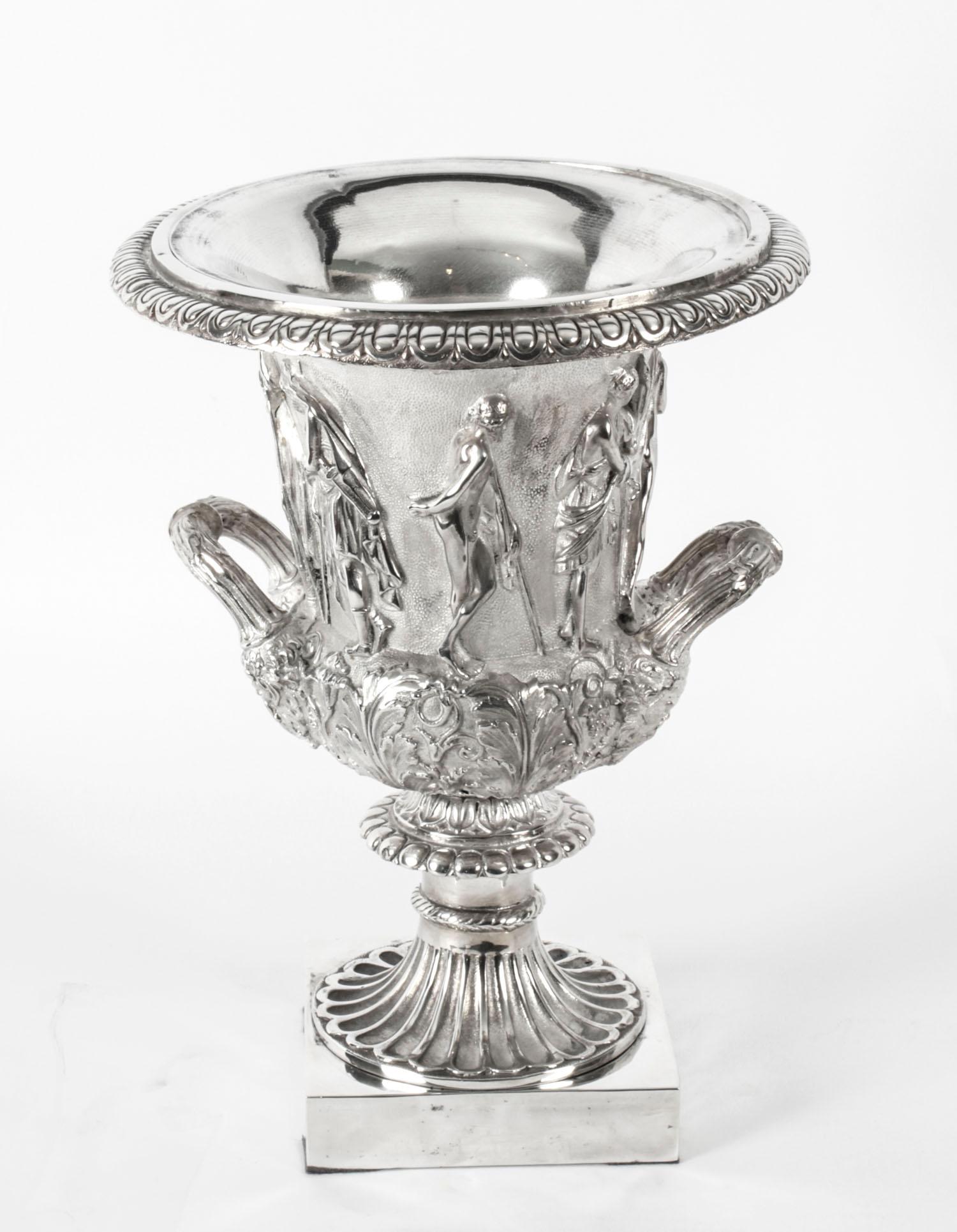 A superb antique pair of Grand Tour silver plated bronze Borghese Campana urns, circa 1880 in date.

This pair of bronze campana urns are after the Borghese models with classical relief decoration with beaded rims and mythological figures on a
