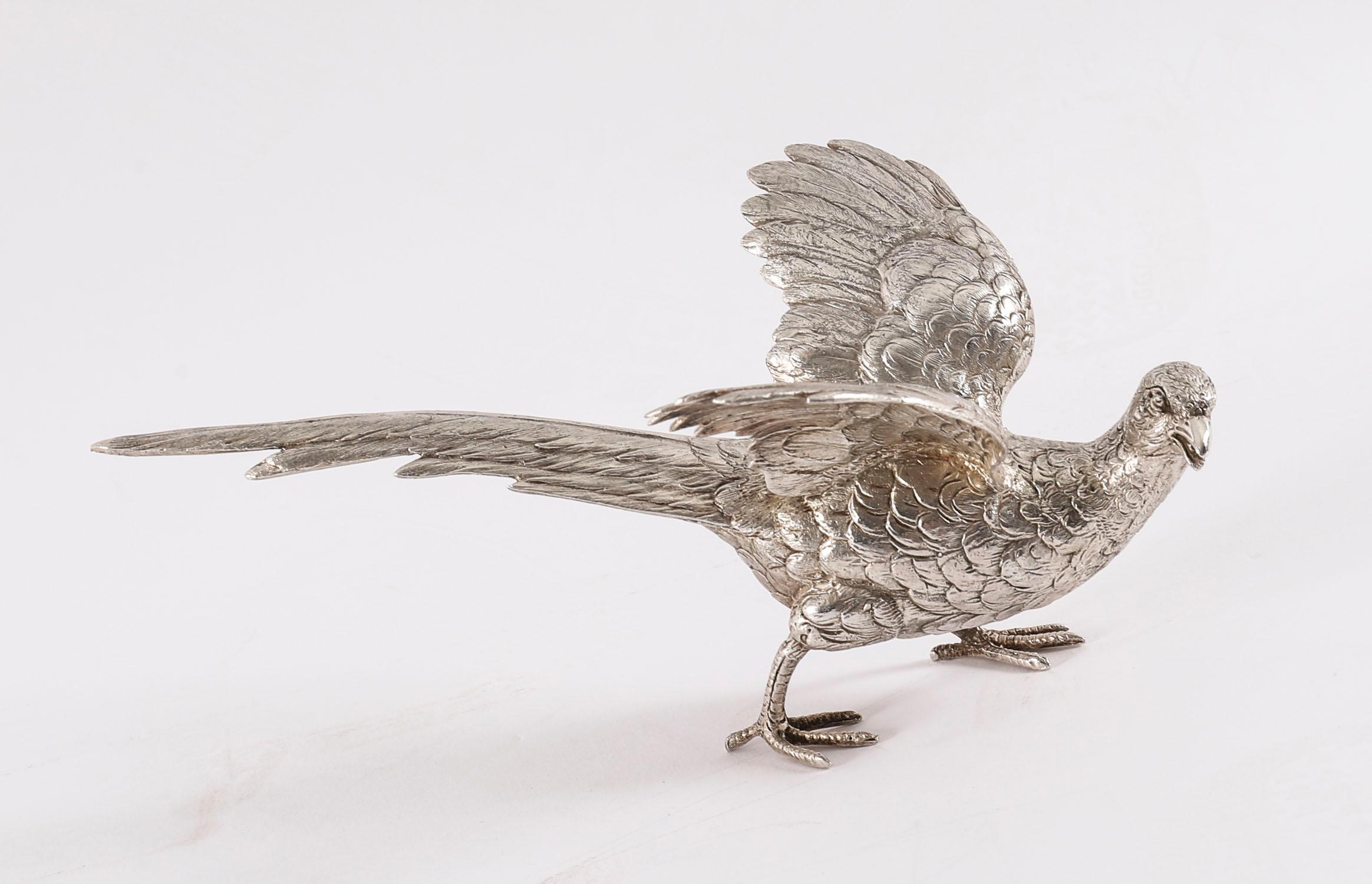 This is a stunning Antique Victorian pair of sterling silver pheasants with exceptional detailing to the modelling of the birds, bearing hallmarks for Edward Barnard & Sons, London 1893.

They are excellent quality examples of these classic