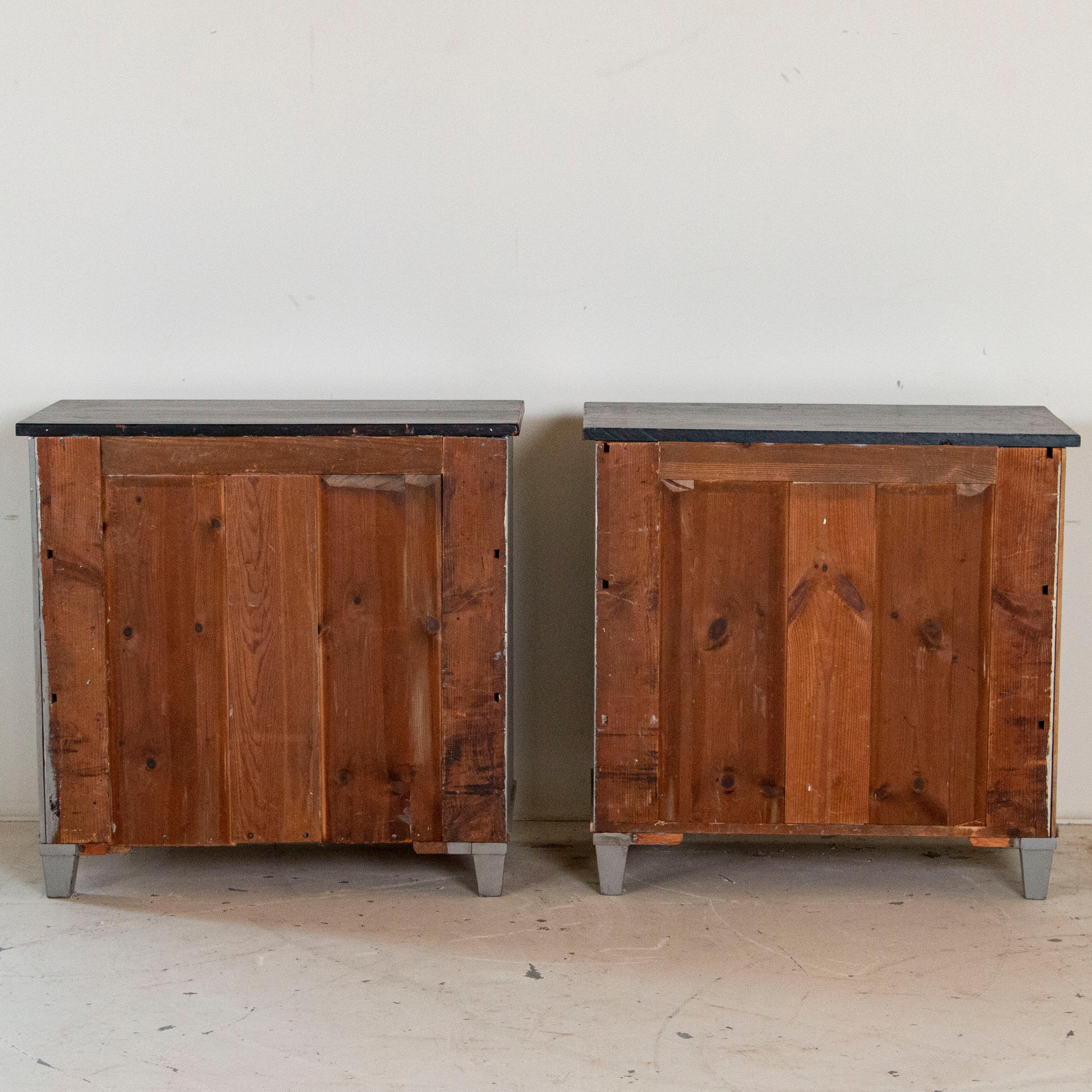 pair of nightstands with drawers