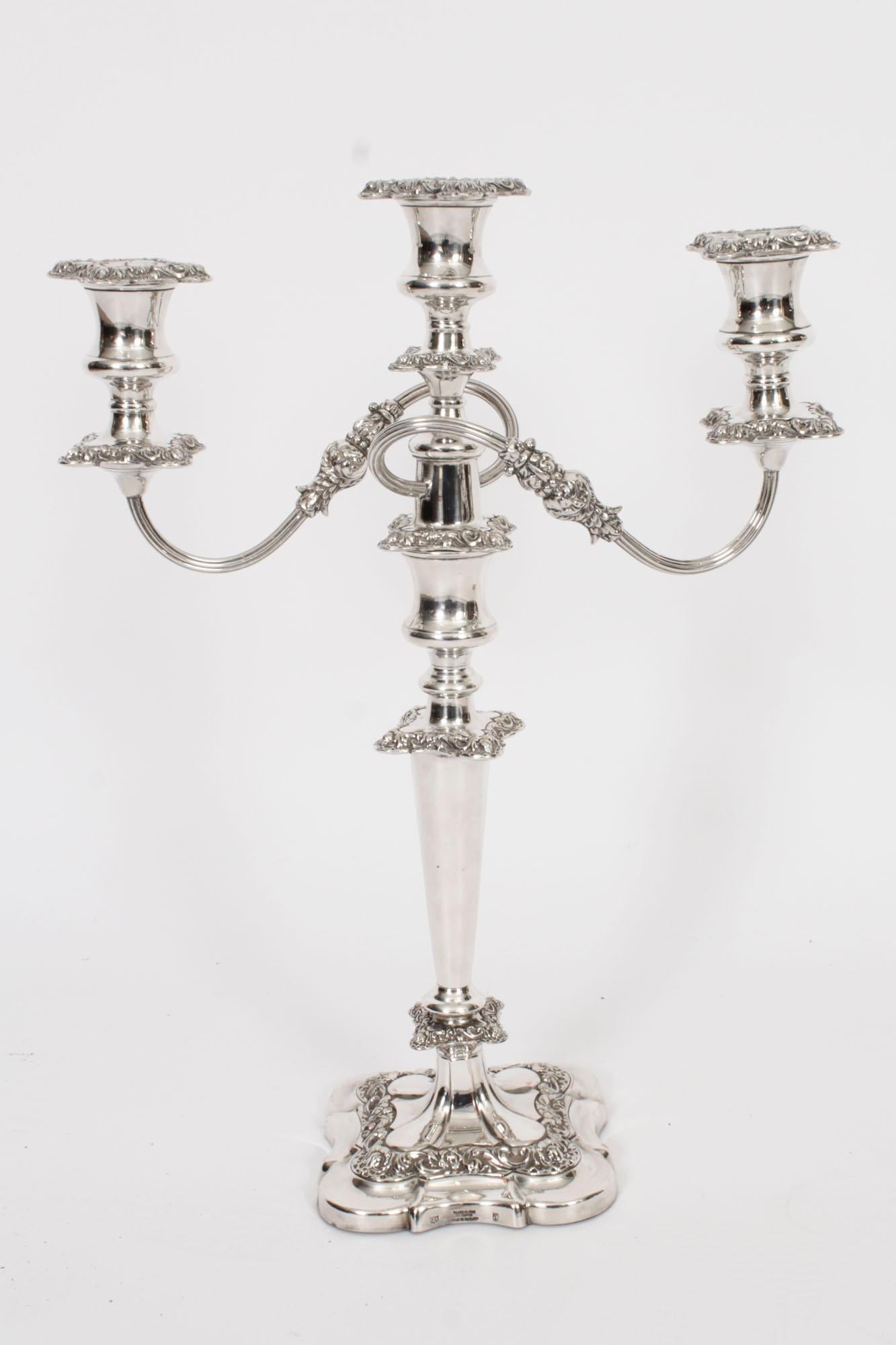 This is a magnificent high-quality pair of antique English silver plate on copper three-light candelabra, each bearing the maker's mark of the renowned silversmith, Stevenson & Law, circa 1920 in date.
 
Each candelabra features an impressive