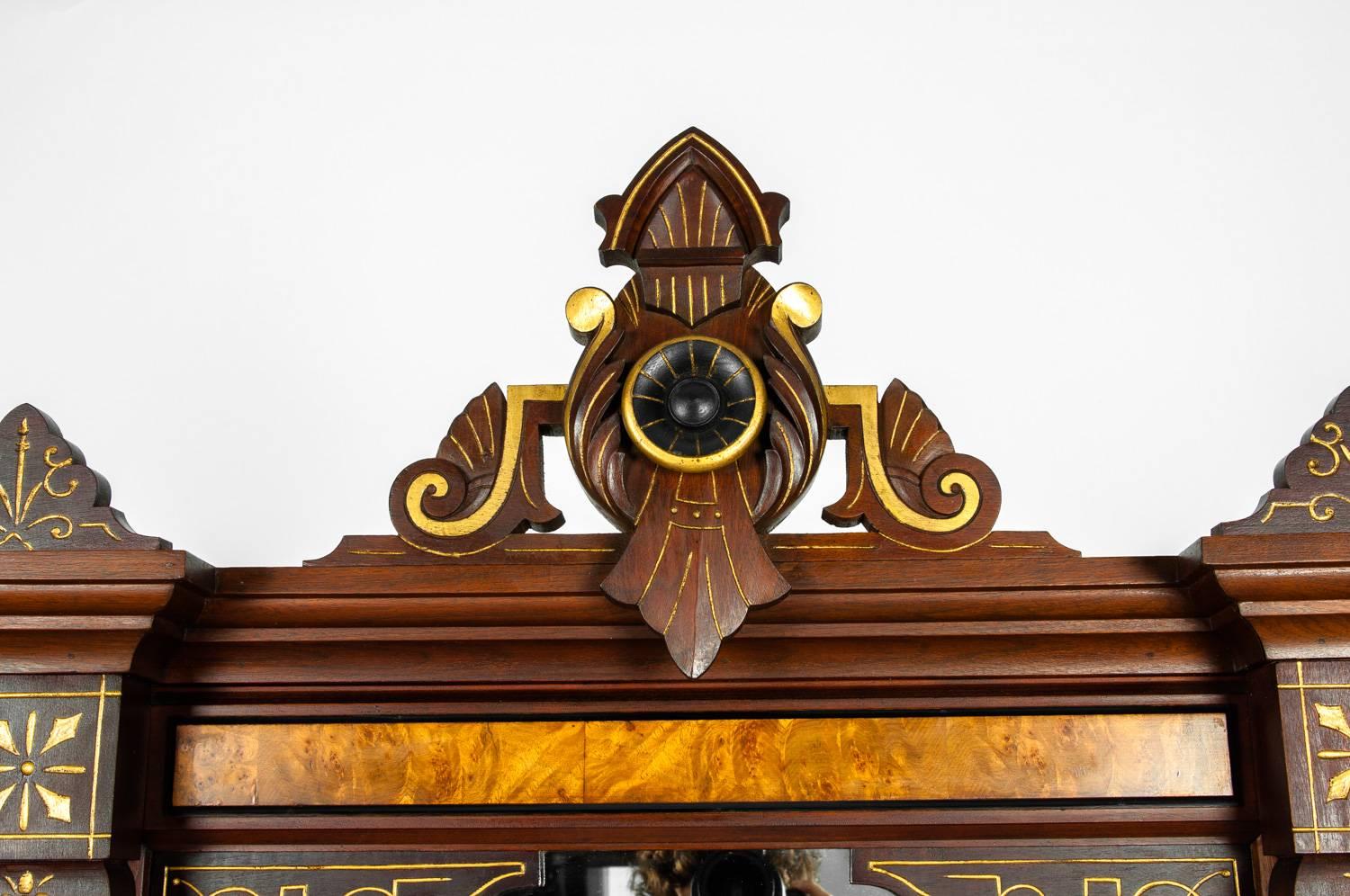 Antique pair of Victorian walnut pier mirrors with burl wood panels design details. Excellent antique condition, each pier mirror measures about 78 inches high and 34 inches width.