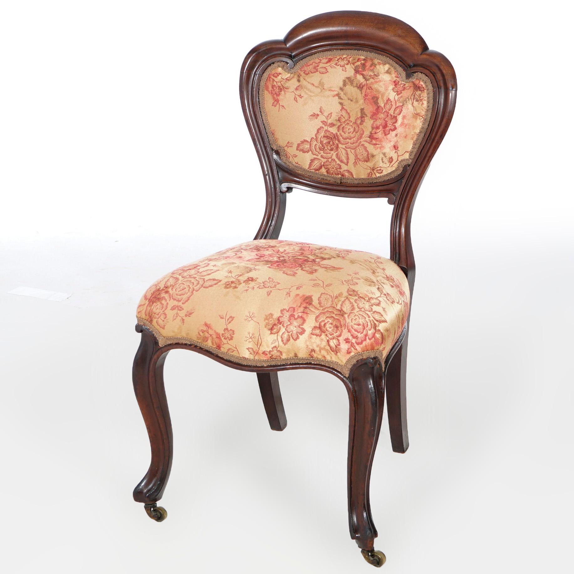 An antique pair of Victorian side chairs offer upholstered mahogany frames with shaped backs and raised on cabriole legs, 19th century. 

Measures- 36.5''H x 19.5''W x 23''D.

*Ask about DISCOUNTED DELIVERY rates within 1,500 miles of NY*