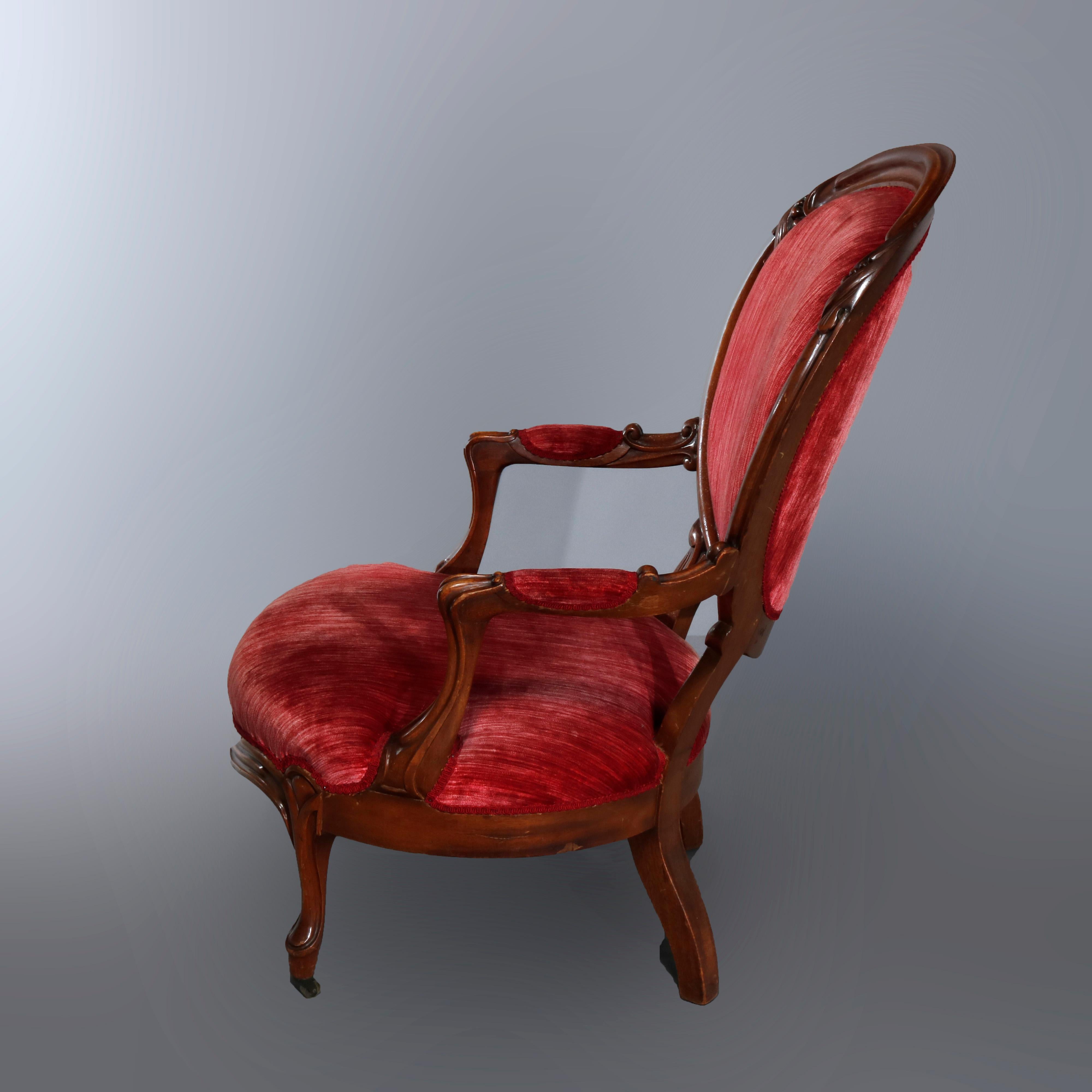 American Pair of Victorian Carved Walnut Arm Upholstered Parlor Armchairs, circa 1890