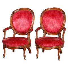 Pair of Victorian Carved Walnut Arm Upholstered Parlor Armchairs, circa 1890