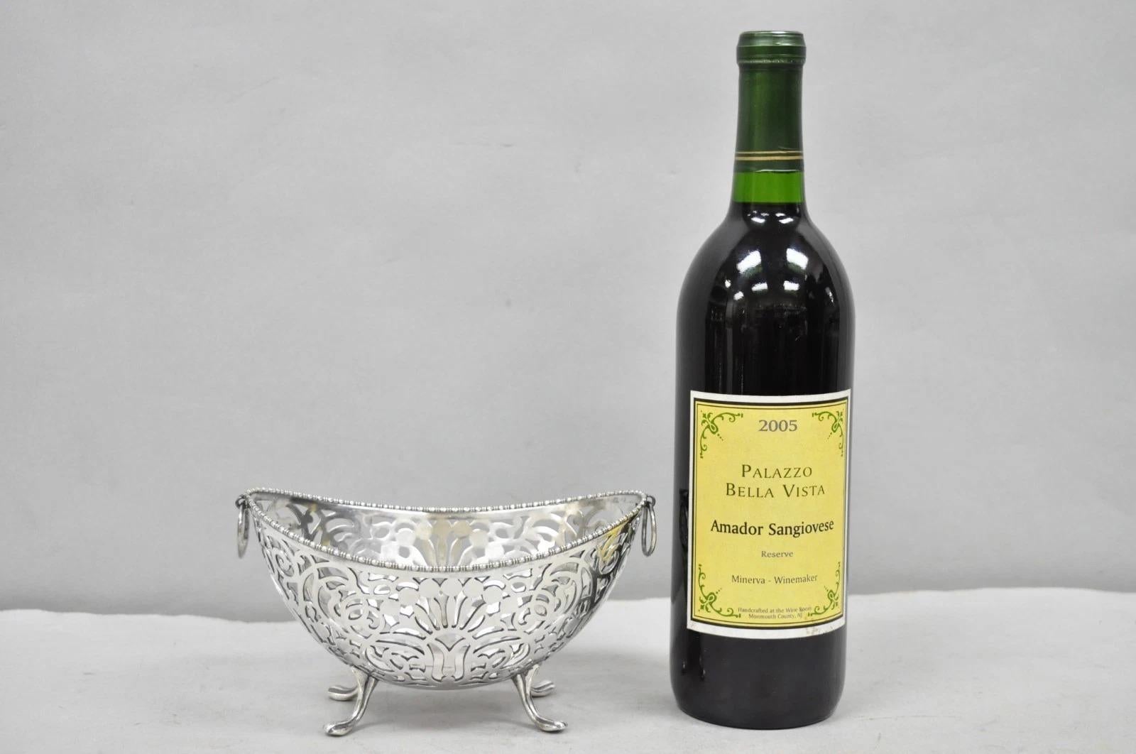 Antico Pairpoint Mfg Co. Piccola ciotola per caramelle con traforo placcata in argento. Circa all'inizio del XX secolo. Misure: 4