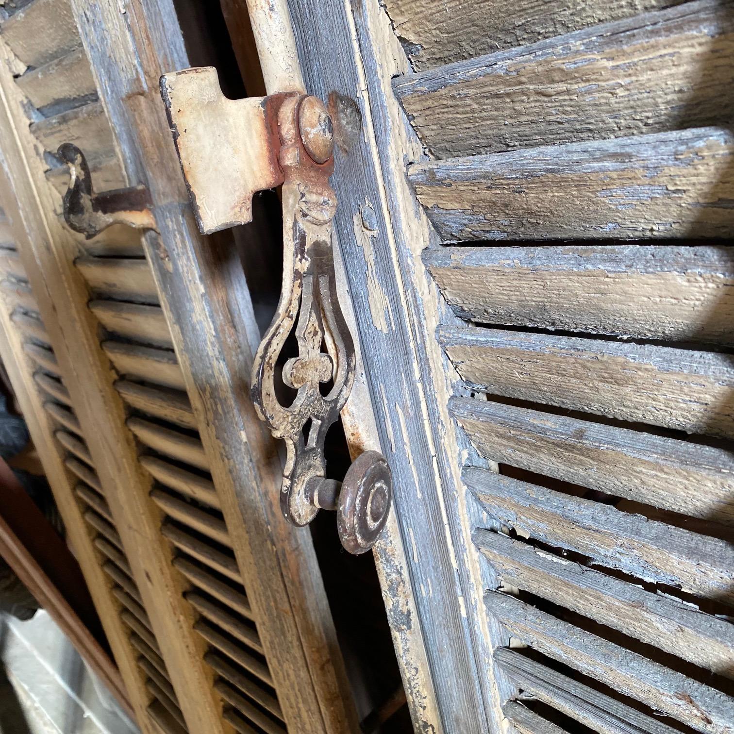 Rustic Antique Pairs of Tall French Painted Shutters from a Chateau in Provence For Sale