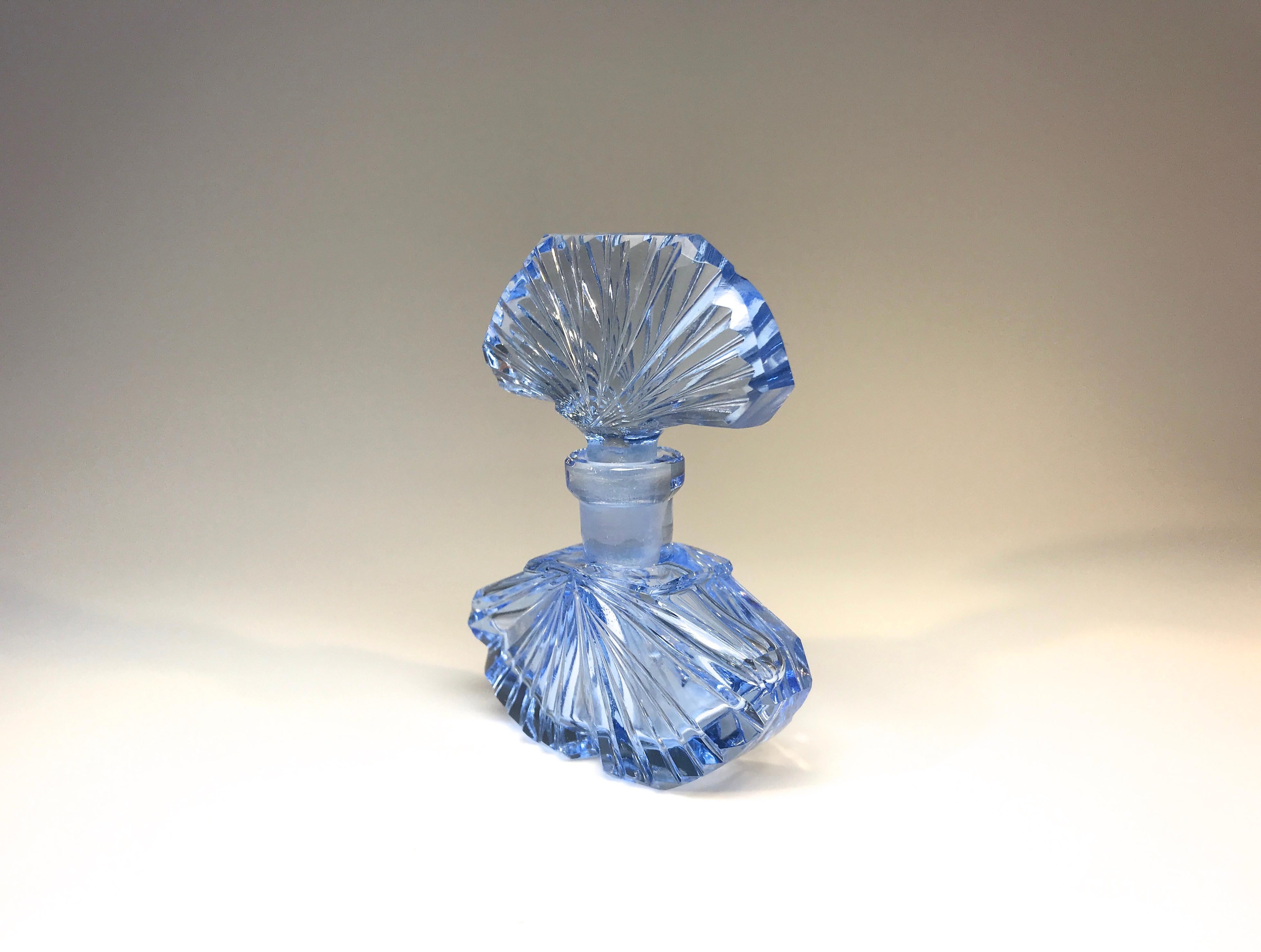 An absolutely delightful antique forget me not blue, crystal fan shaped perfume bottle
petite bohemia Czech crystal bottle, complete with matching glass stopper and delicate scent rod in excellent condition,
circa 1920s
Measures: Height 2.75